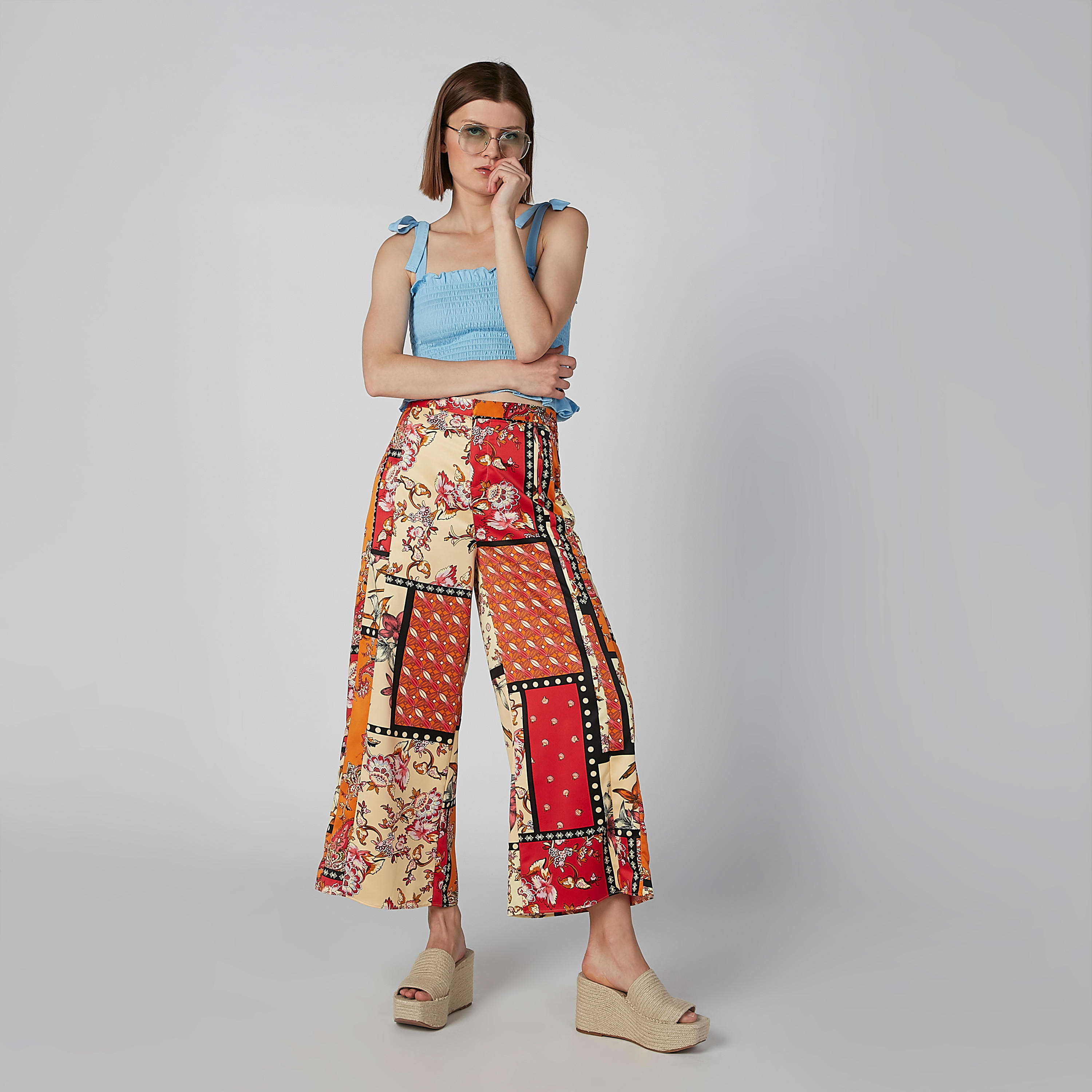 بنطلون بالازو مستدام بقصّة واسعة وخصر متوسط الارتفاع وطبعات زهرية -women-clothing-bottoms-trousers-image-4