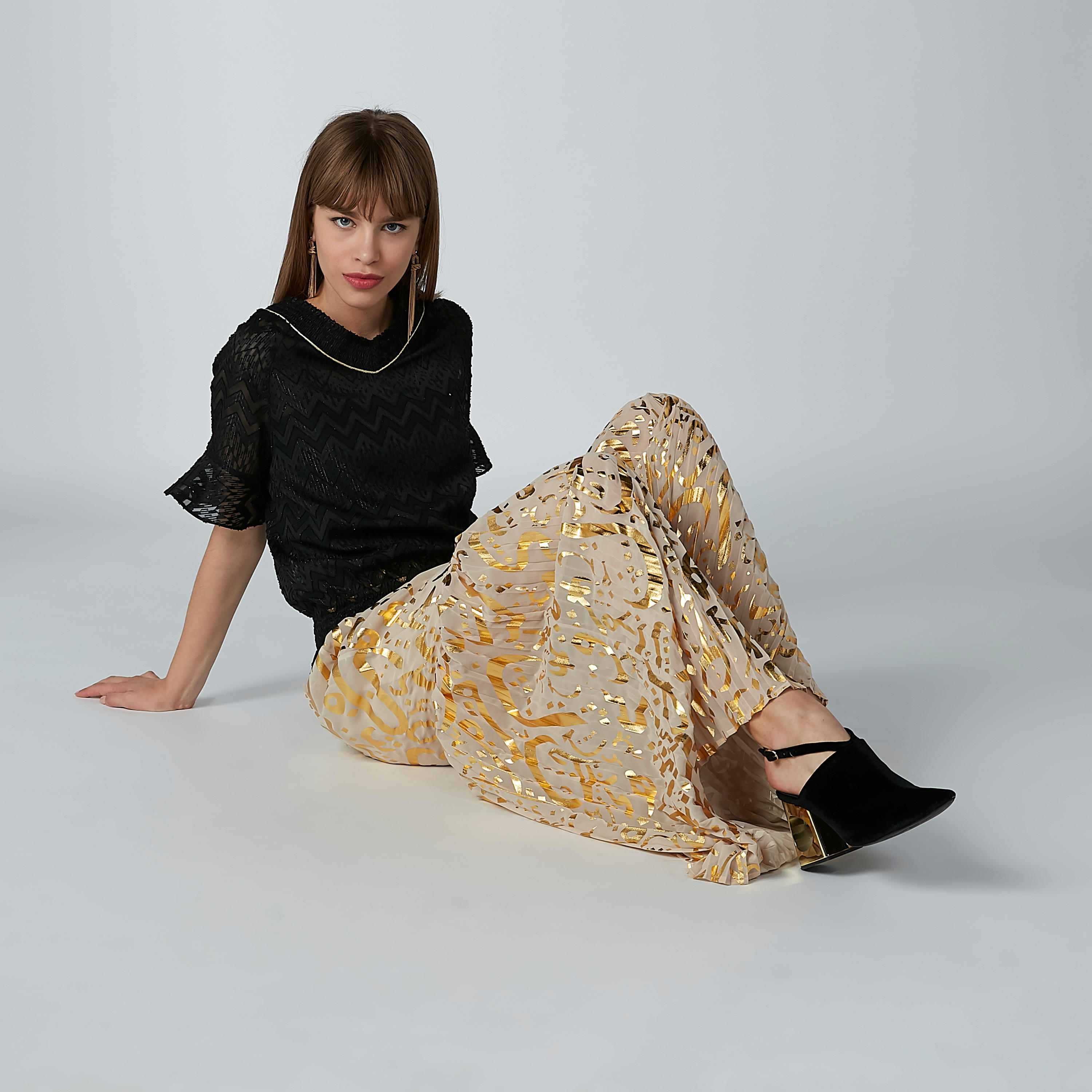 بنطال بالازو بقصّة واسعة وخصر مطاطي وطبعات-women-clothing-bottoms-trousers-image-1