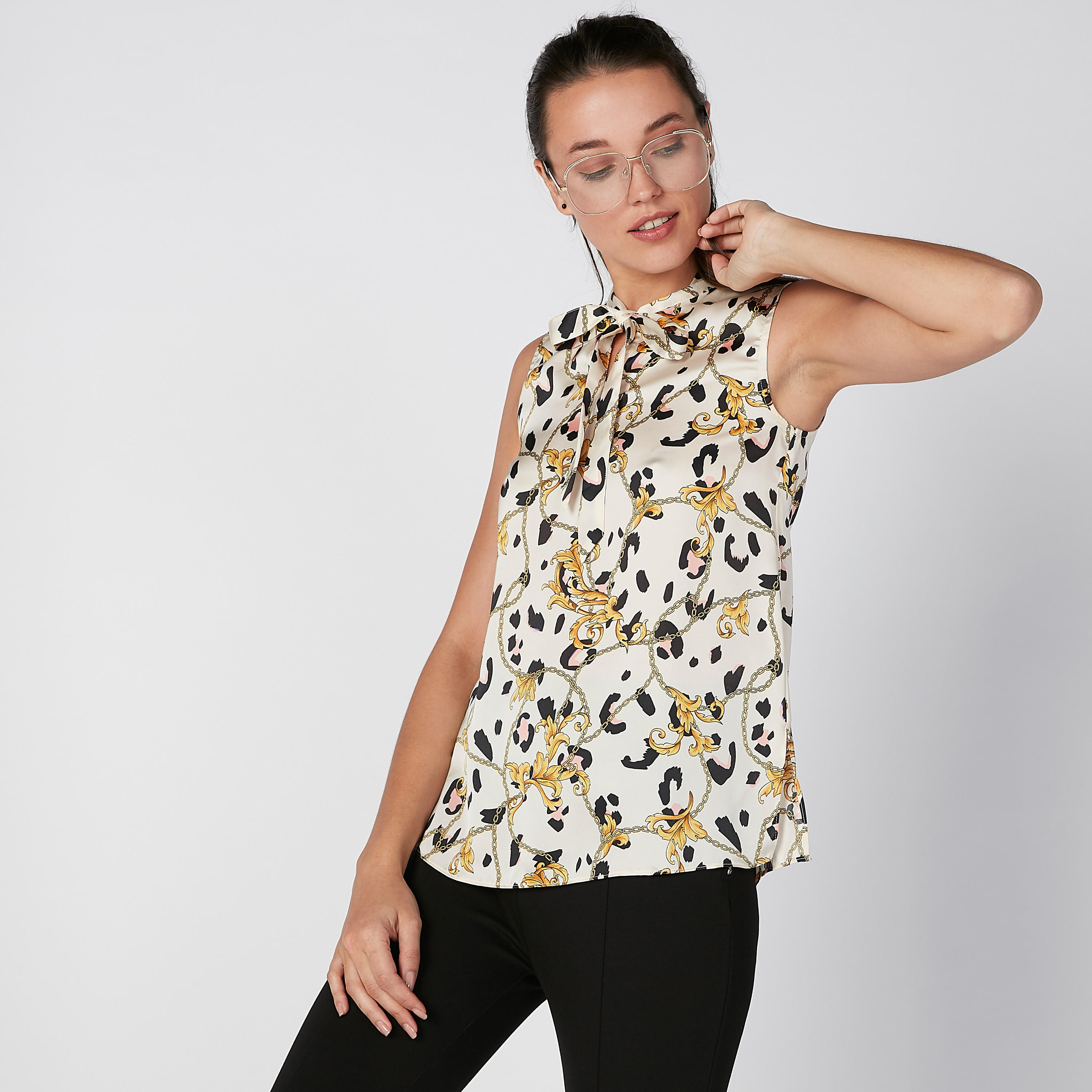 بلوزة مستدامة دون أكمام مزيّنة بفيونكة وطبعات -women-clothing-shirtsandblouses-blouses-image-1
