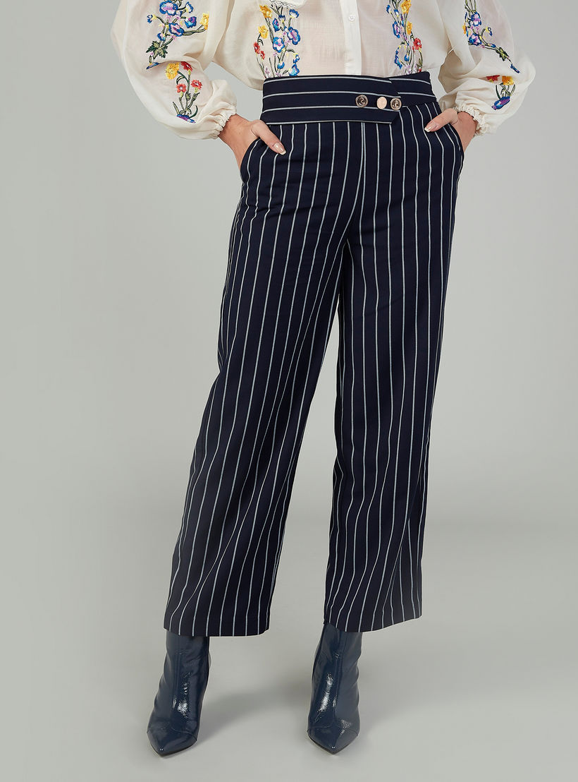 بنطلون مقلّم بقصّة سليم وخصر متوسط الارتفاع وجيوب-women-clothing-bottoms-trousers-image-1