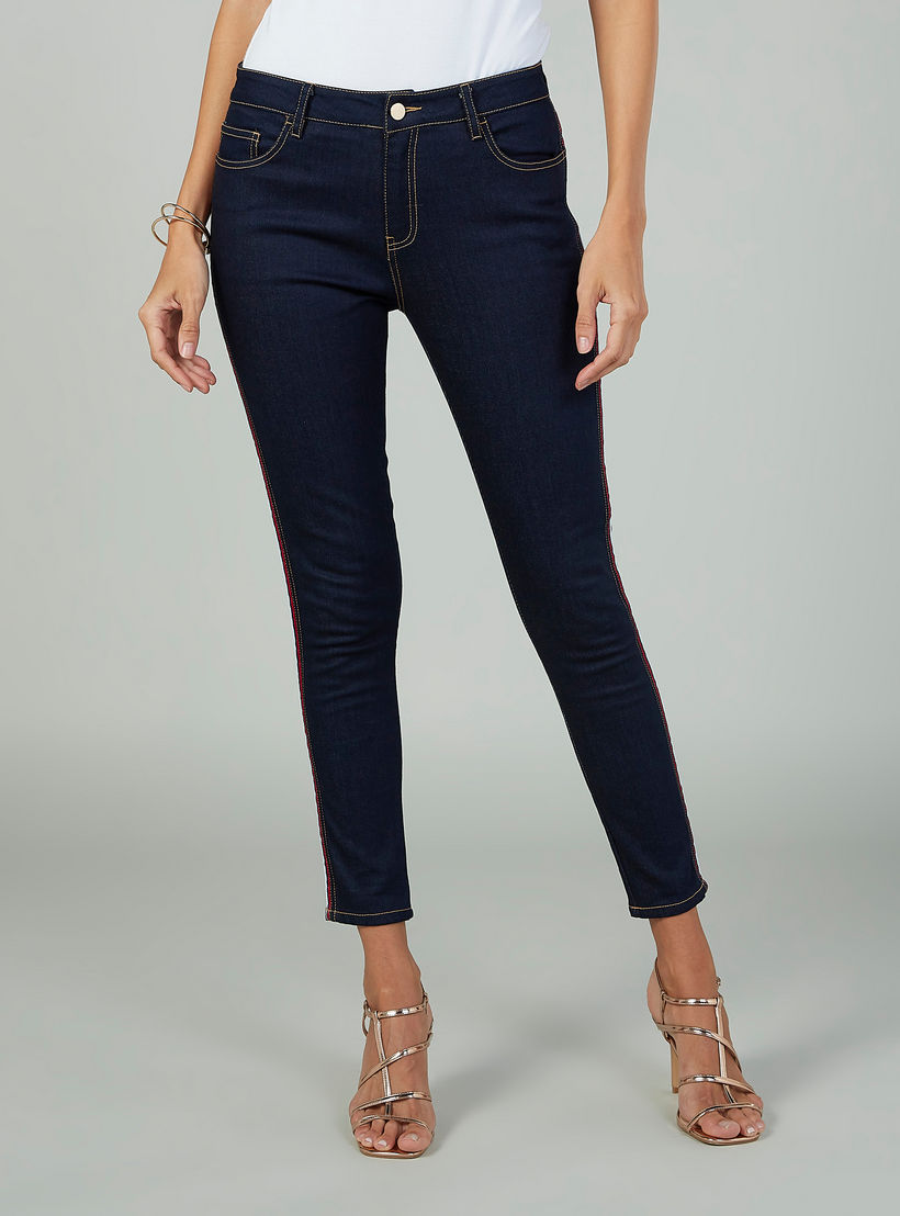 بنطلون جينز سكيني قصير سادة بخصر متوسط الإرتفاع وجيوب-women-clothing-bottoms-jeans-image-1