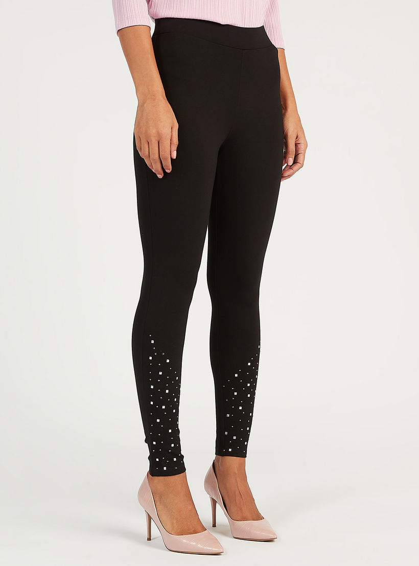 بنطلون تريقينز سادة بقصة سكيني وخصر مطاطي وتفاصيل مزينة-women-clothing-bottoms-leggings-image-1