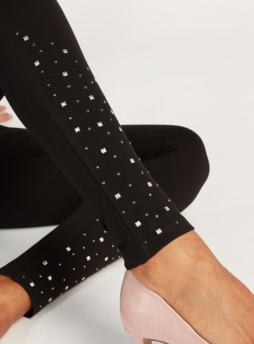 بنطلون تريقينز سادة بقصة سكيني وخصر مطاطي وتفاصيل مزينة-women-clothing-bottoms-leggings-image-3