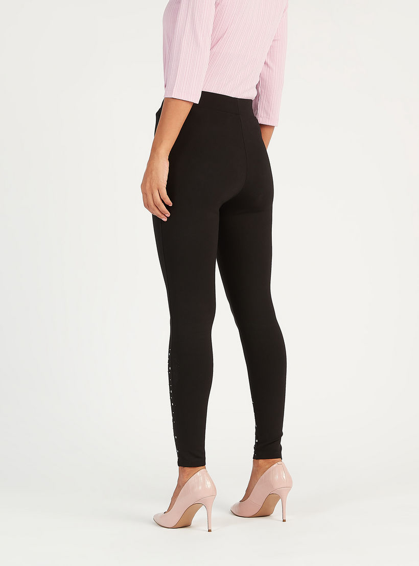 بنطلون تريقينز سادة بقصة سكيني وخصر مطاطي وتفاصيل مزينة-women-clothing-bottoms-leggings-image-4