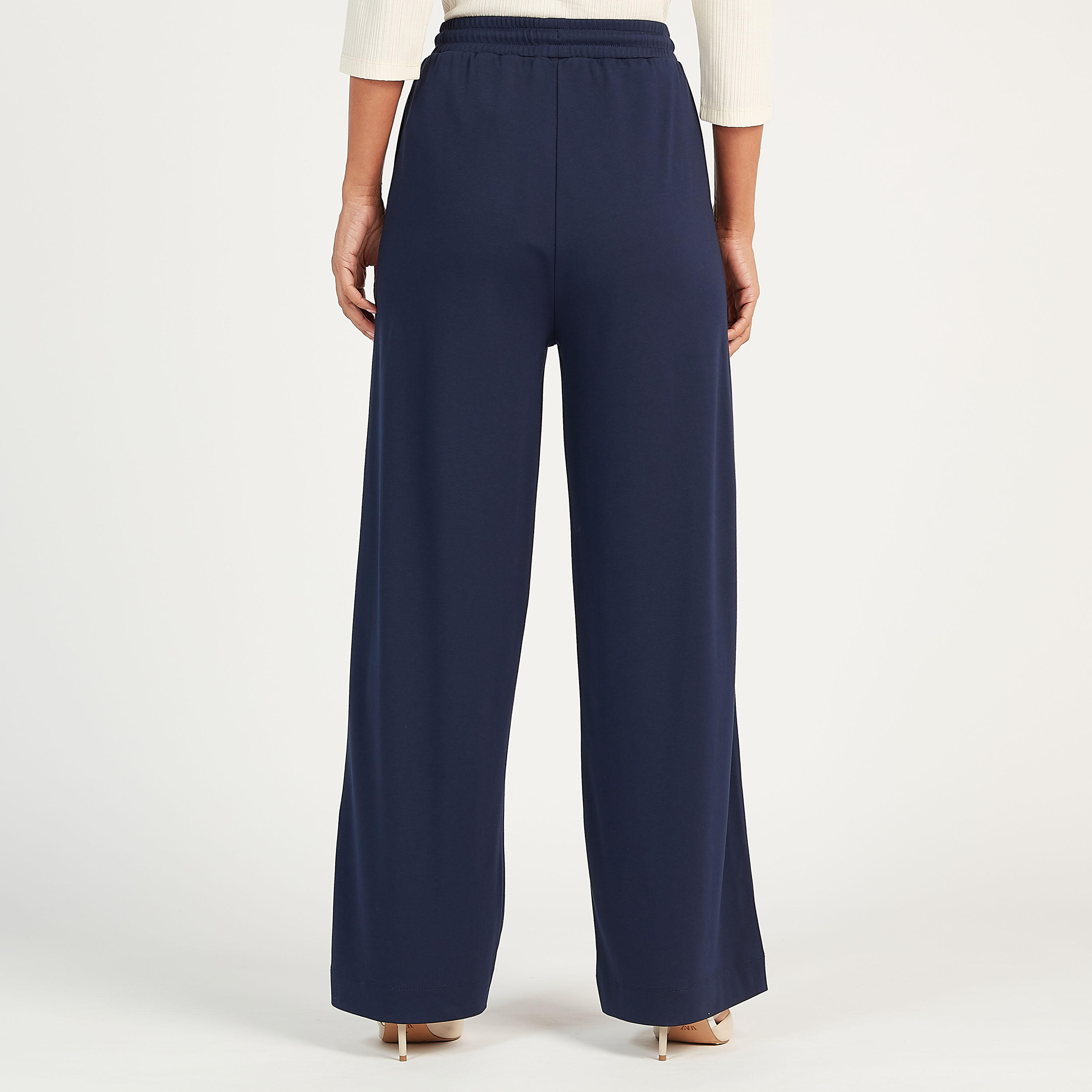 بنطلون سادة بساق واسعة وخصر مطّاطي متوسّط الارتفاع وجيوب-women-clothing-bottoms-trousers-image-4