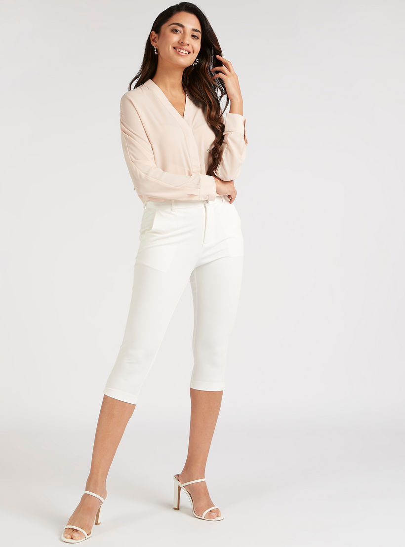 بنطلون قصير سادة بخصر متوسط الارتفاع وزر إغلاق-women-clothing-bottoms-trousers-image-4