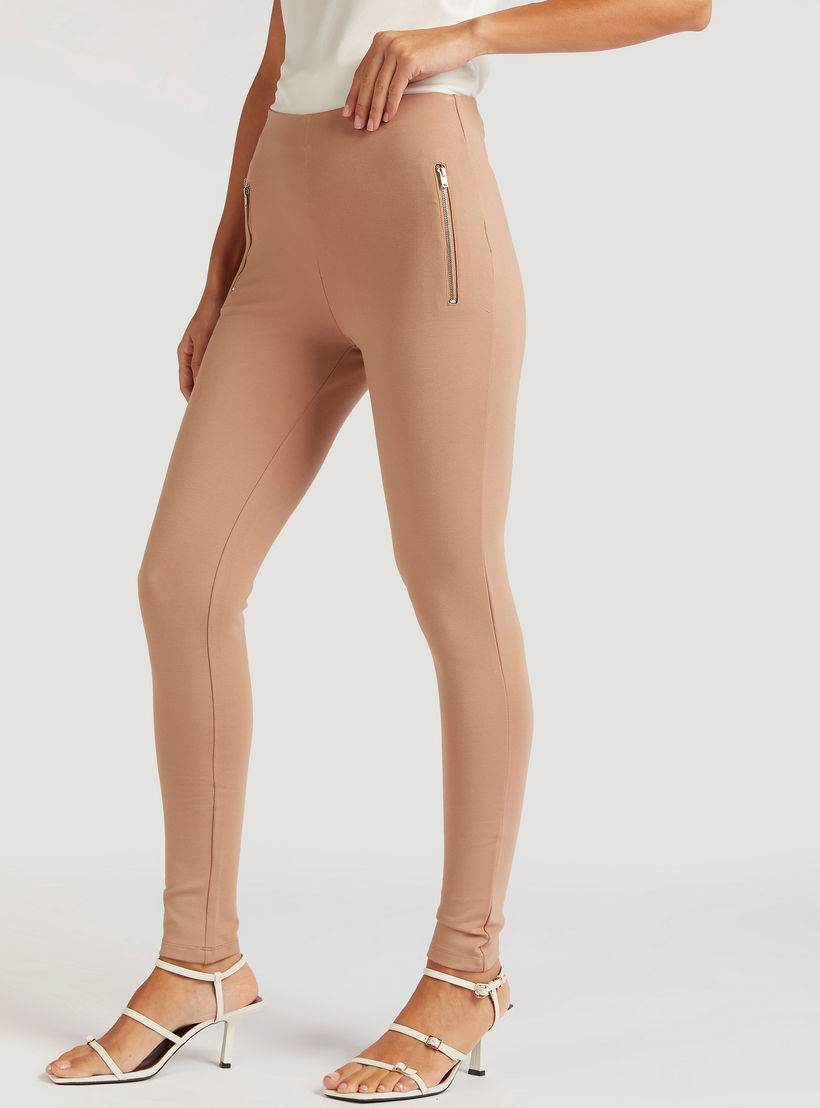 بنطلون تريقنز سادة بجيوب بسحاب-women-clothing-bottoms-leggings-image-4