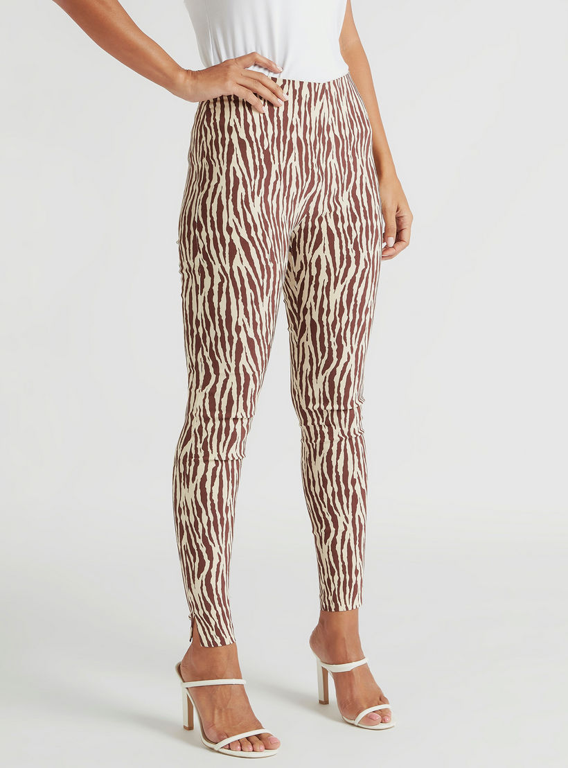 بنطلون تريقنز طويل بطبعات حيوانات بتفاصيل فتحات جانبيّة-women-clothing-bottoms-trousers-image-1