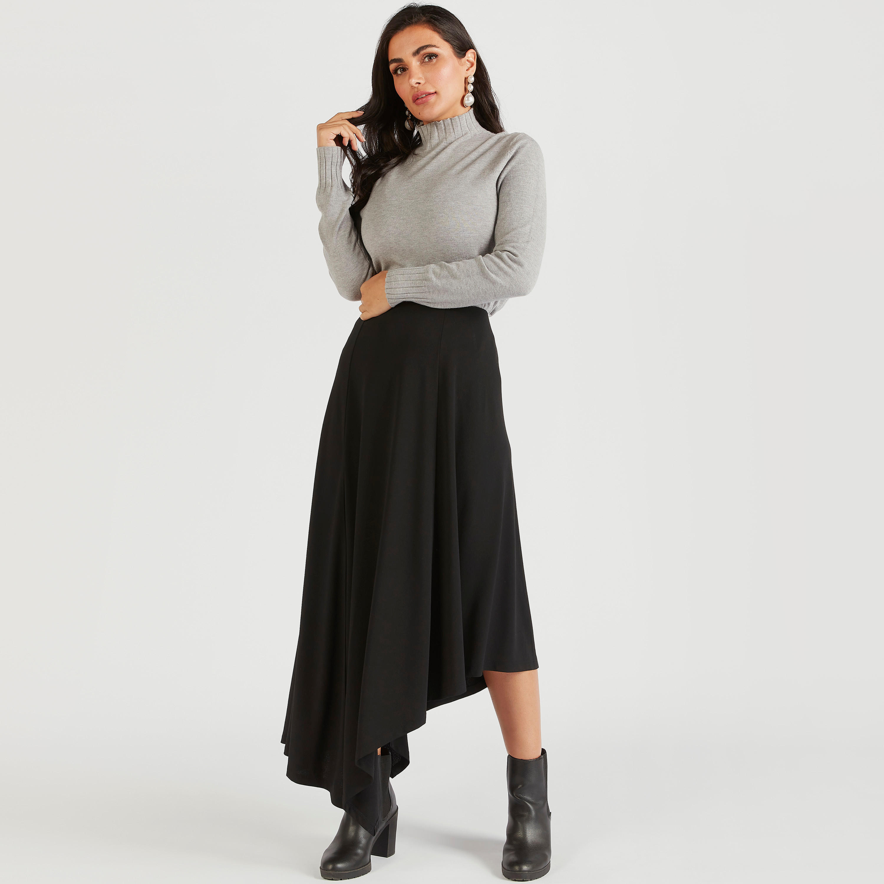 تنّورة ميدي سادة بأطراف غير مستوية وخصر مطاطي-women-clothing-bottoms-skirts-image-3