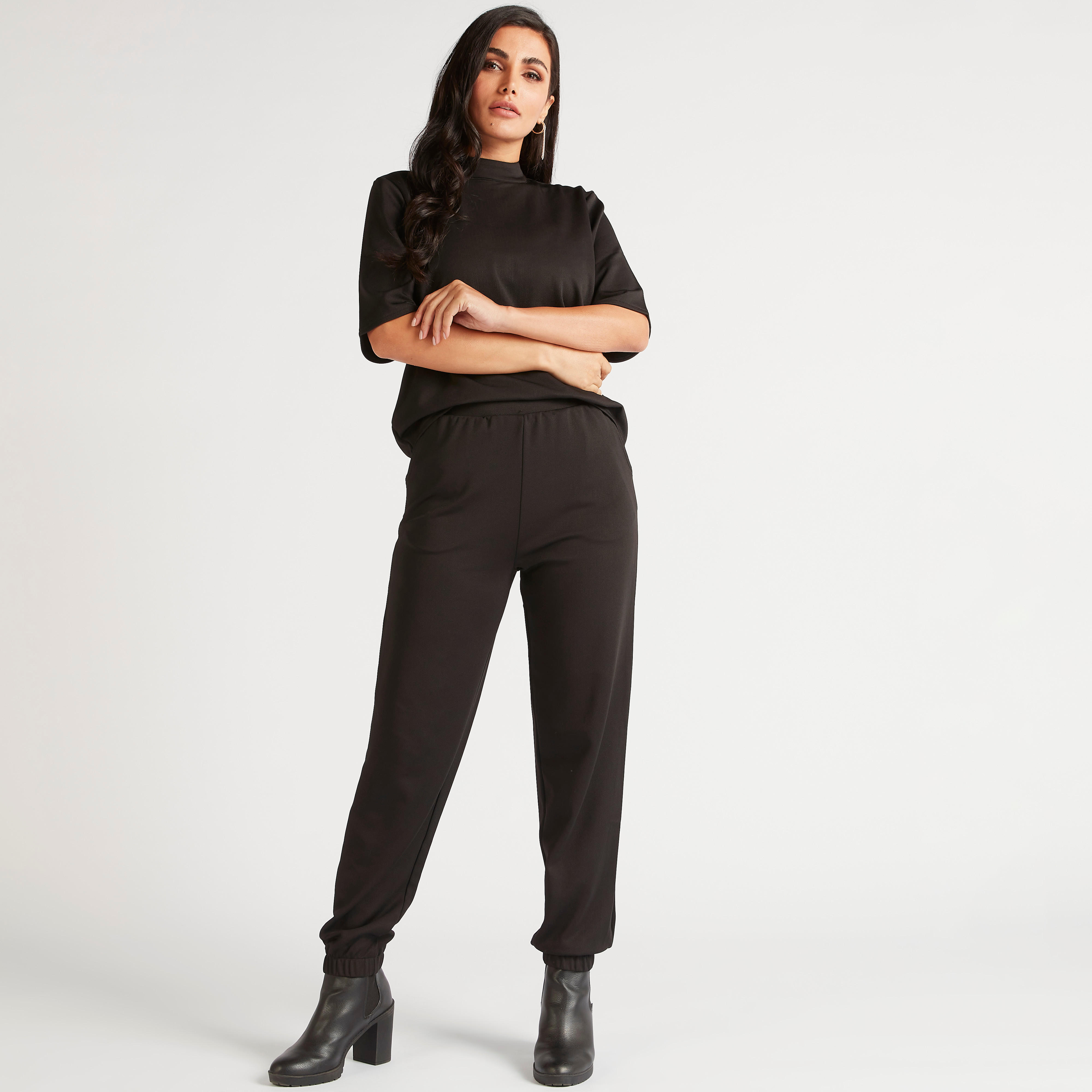 بنطلون رياضي سادة بخصر مطاطي متوسط الارتفاع وجيوب-women-clothing-bottoms-joggers-image-2