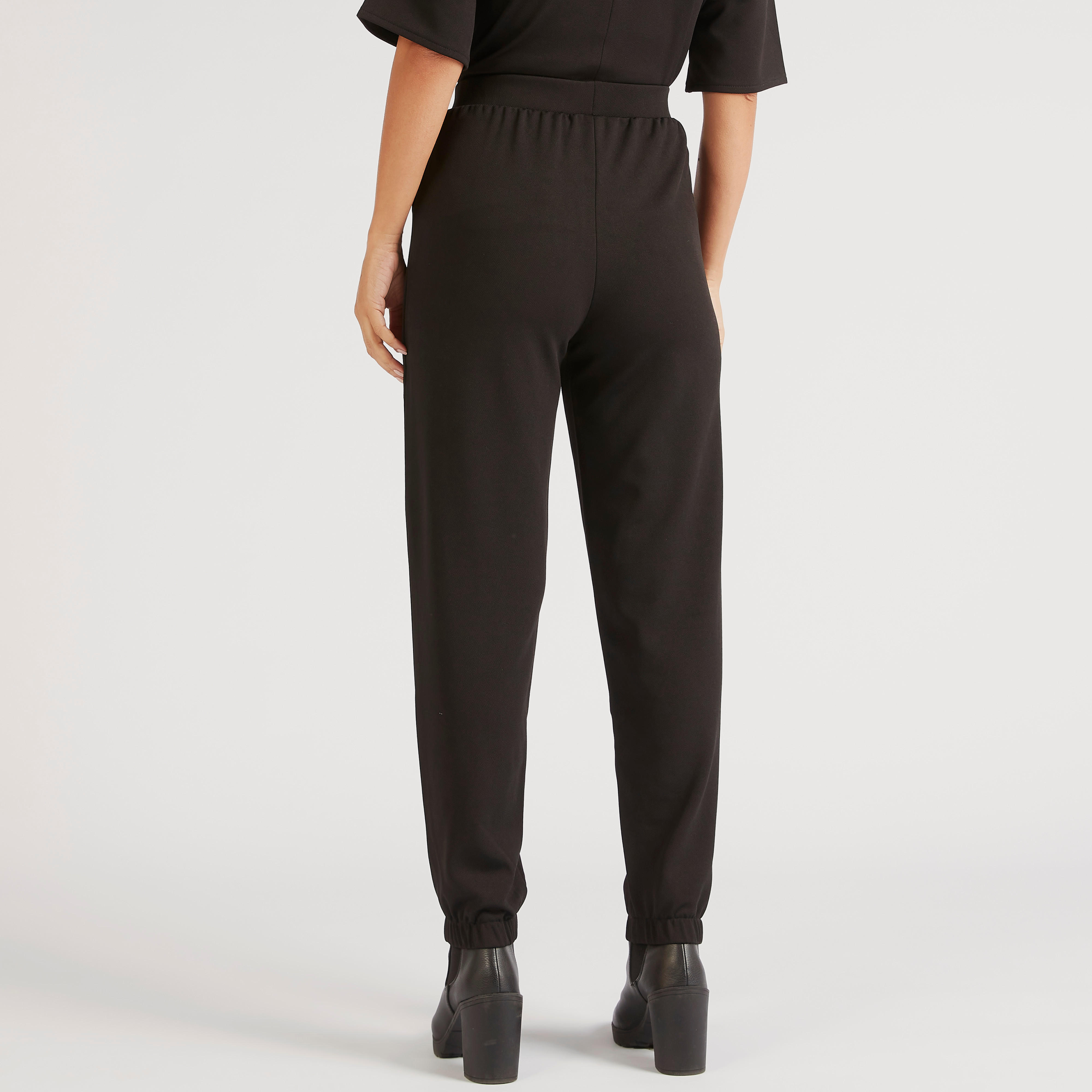 بنطلون رياضي سادة بخصر مطاطي متوسط الارتفاع وجيوب-women-clothing-bottoms-joggers-image-4