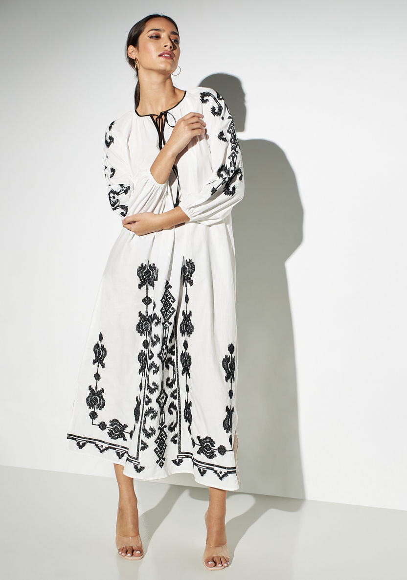 Shop Embroidered Volume Sleeve A-line Dress with Tie-Ups Online | Splash Saudi Shop Embroidered Volume Sleeve A-line Dress with Tie-Ups Online | Splash Saudi