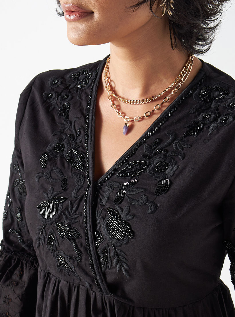 فستان متعدد الطبقات مزين بالزهور بياقة V وأكمام 3/4-women-clothing-dresses-image-4