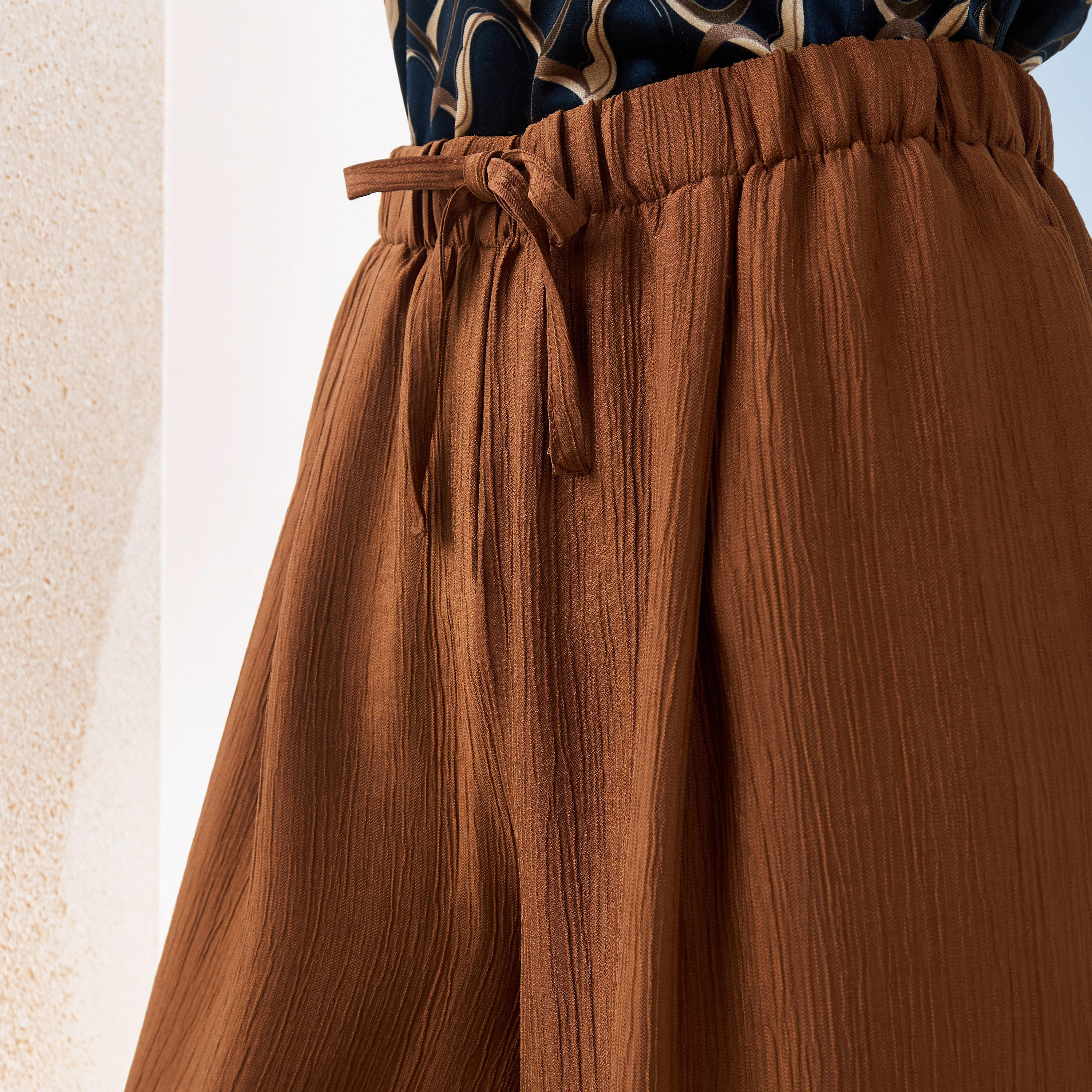 بنطلون بقصة مريحة وملمس بارز-women-clothing-trousers-image-4