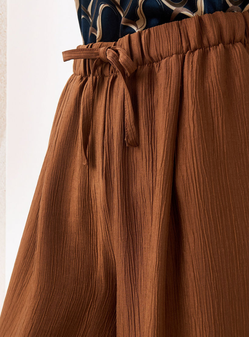 بنطلون بقصة مريحة وملمس بارز-women-clothing-trousers-image-4