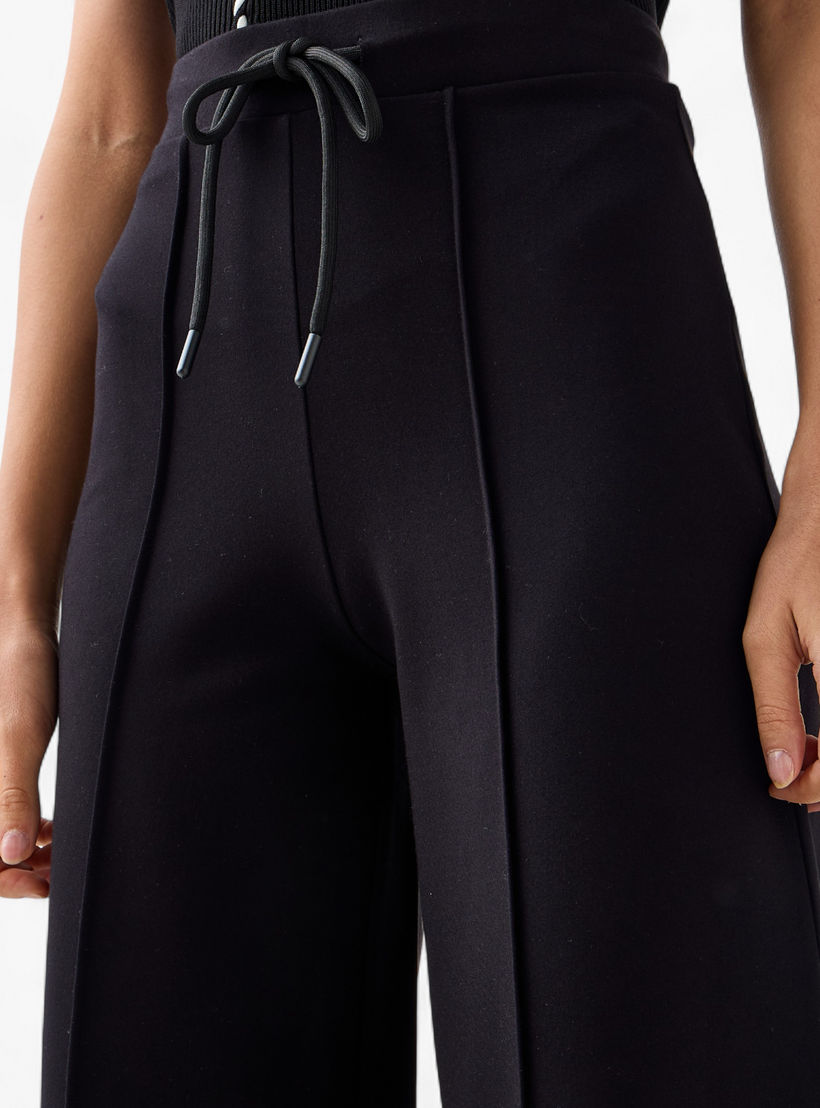 بنطلون واسع قصير بتفاصيل خط بارز-women-clothing-bottoms-trousers-image-5