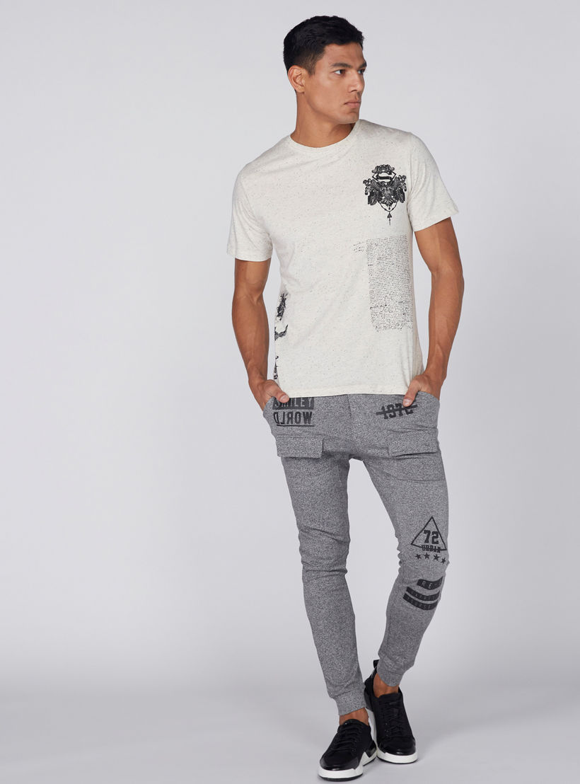 بنطال رياضي بخصر مطّاطي وطبعات سمايلي وورلد-men-clothing-bottoms-joggers-image-1