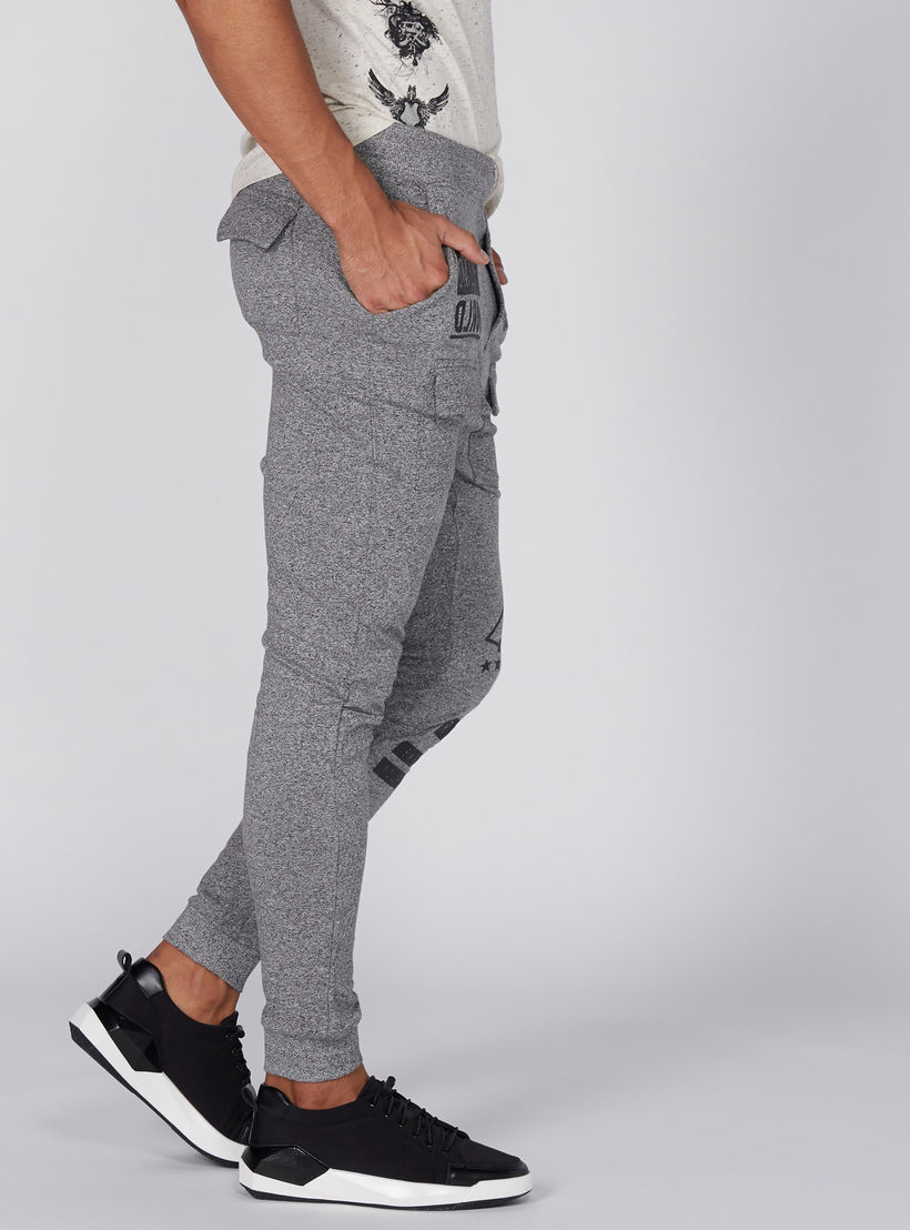 بنطال رياضي بخصر مطّاطي وطبعات سمايلي وورلد-men-clothing-bottoms-joggers-image-4