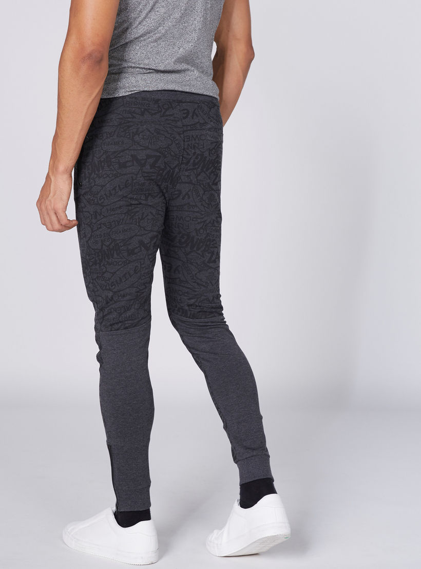 بنطال رياضي طويل بخصر مطاطي مزيّن بطبعات سمايلي وورلد-men-clothing-bottoms-joggers-image-2