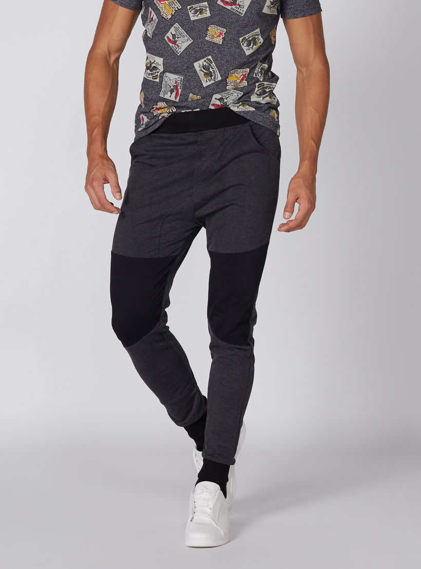 بنطال رياضي طويل بخصر مطاطّي من سمايلي وورلد-men-clothing-bottoms-joggers-image-1