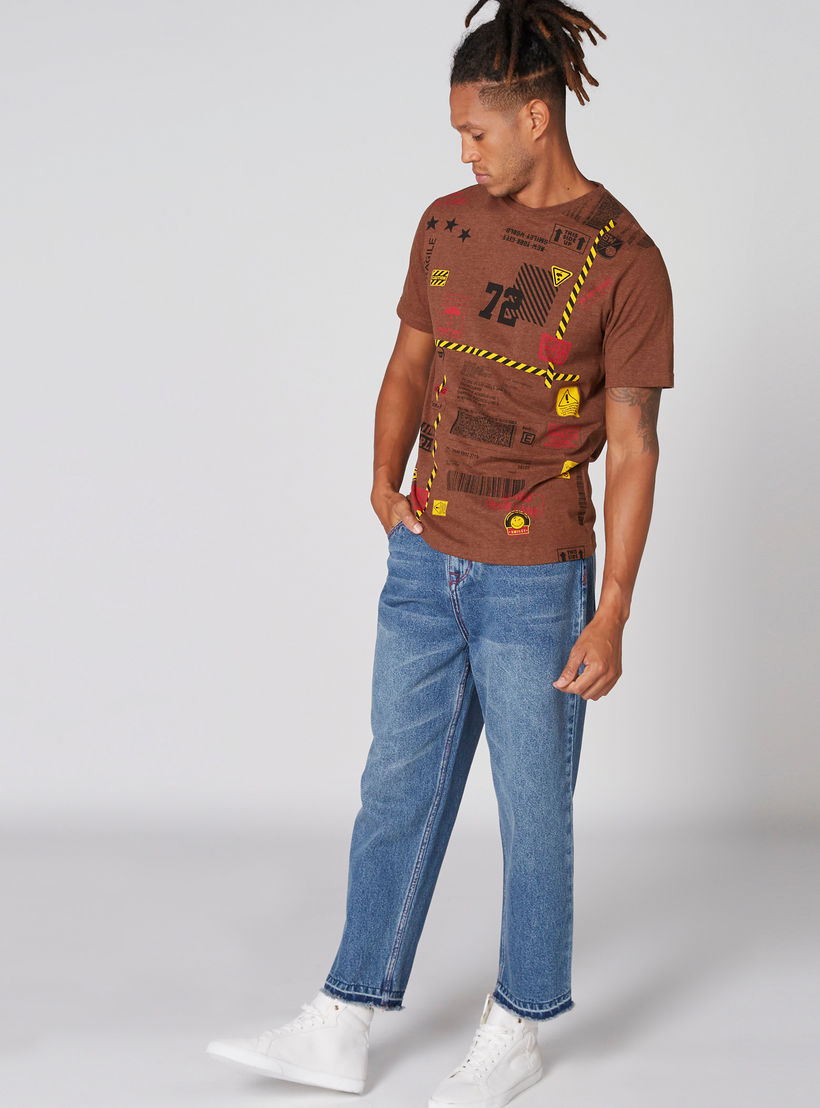 تيشيرت بياقة ضيّقة وأكمام قصيرة وطبعات سمايلي وورلد-men-clothing-tshirtsandpolos-tshirts-image-1