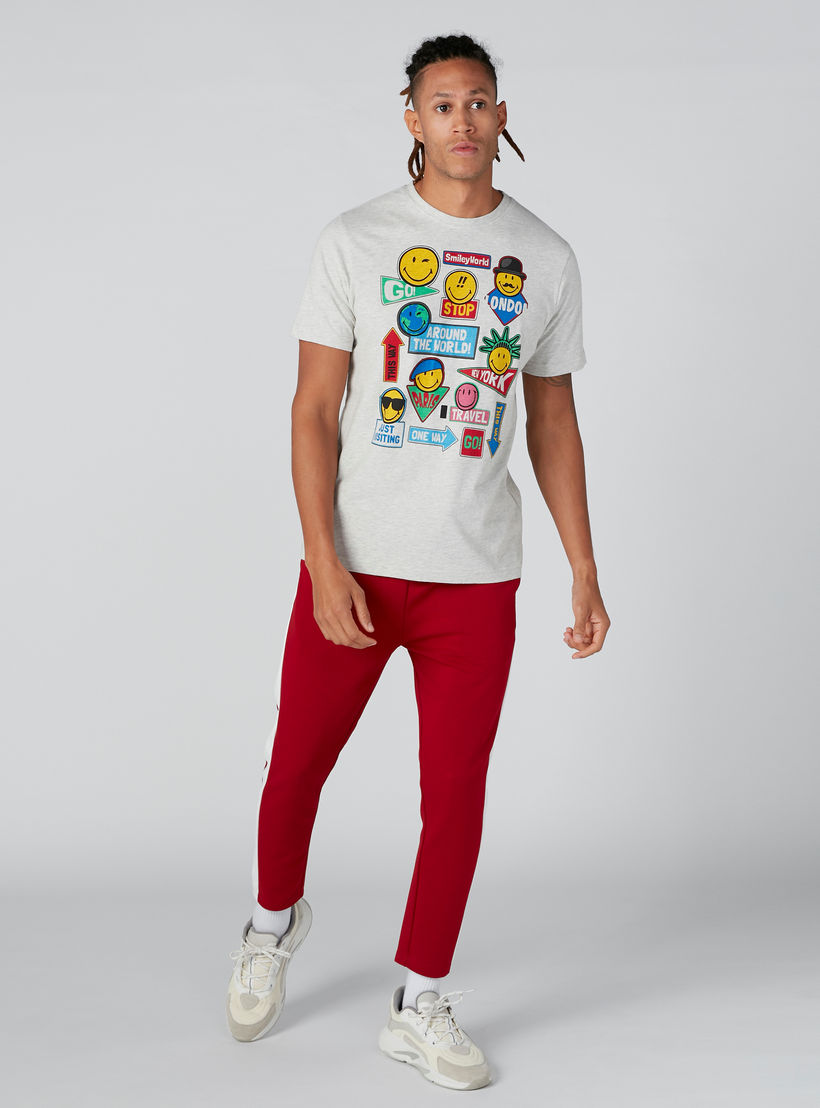 تيشيرت مستدام بأكمام قصيرة وطبعات سمايلي وورلد-men-clothing-tshirtsandpolos-tshirts-image-3