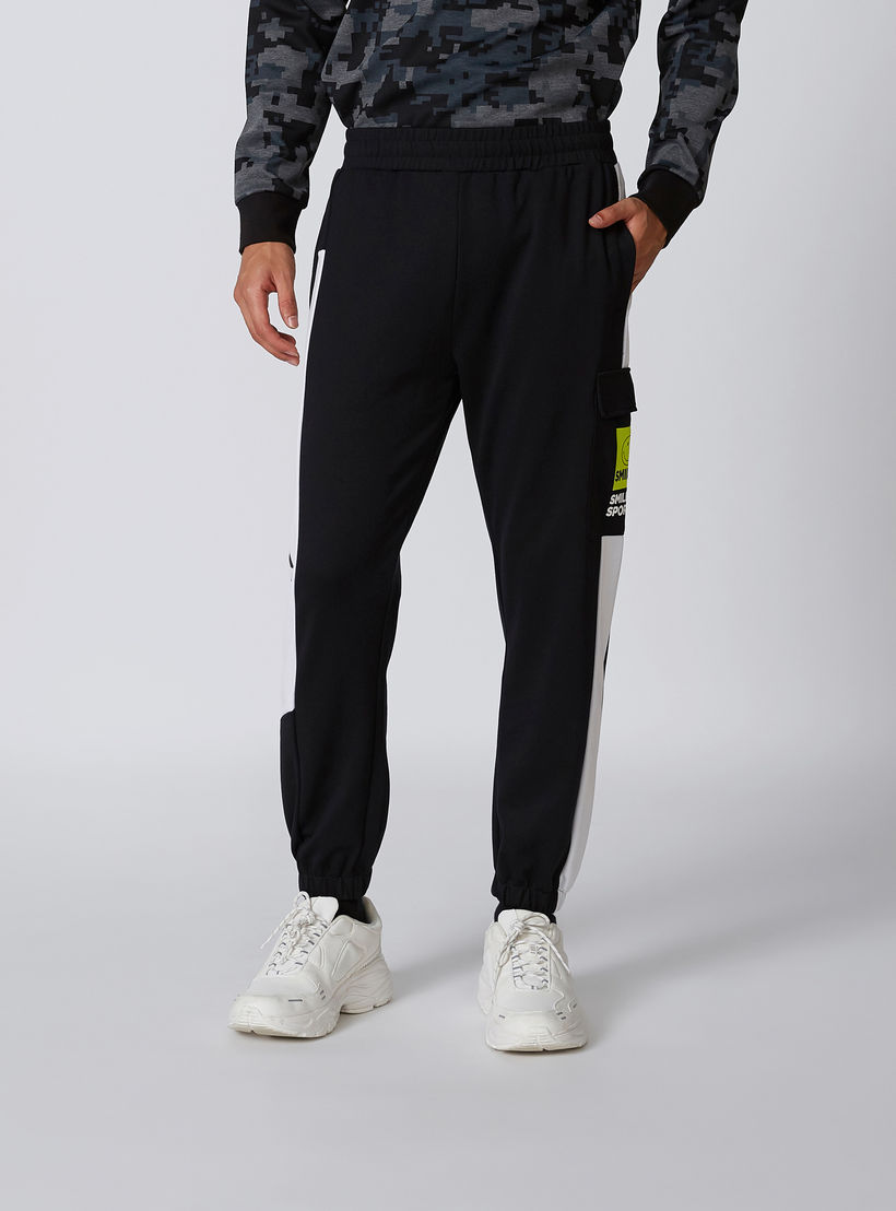 بنطال رياضي بقصّة سليم وخصر متوسط الارتفاع وجيوب وطبعات سمايلي وورلد-men-clothing-bottoms-joggers-image-3