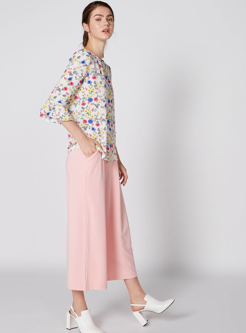 بنطال واسع الساقين بخصر مطّاطي وجيوب-women-clothing-bottoms-trousers-image-1