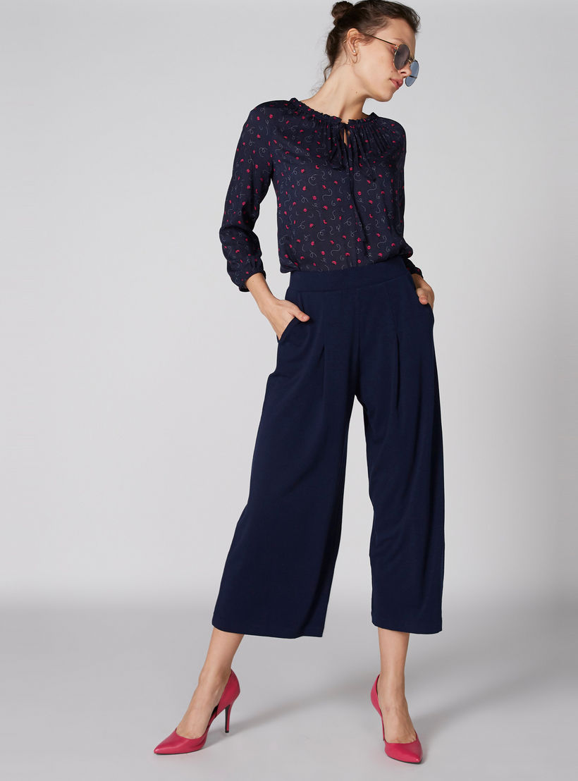 بنطال واسع الساقين بخصر مطّاطي وجيوب-women-clothing-bottoms-trousers-image-3