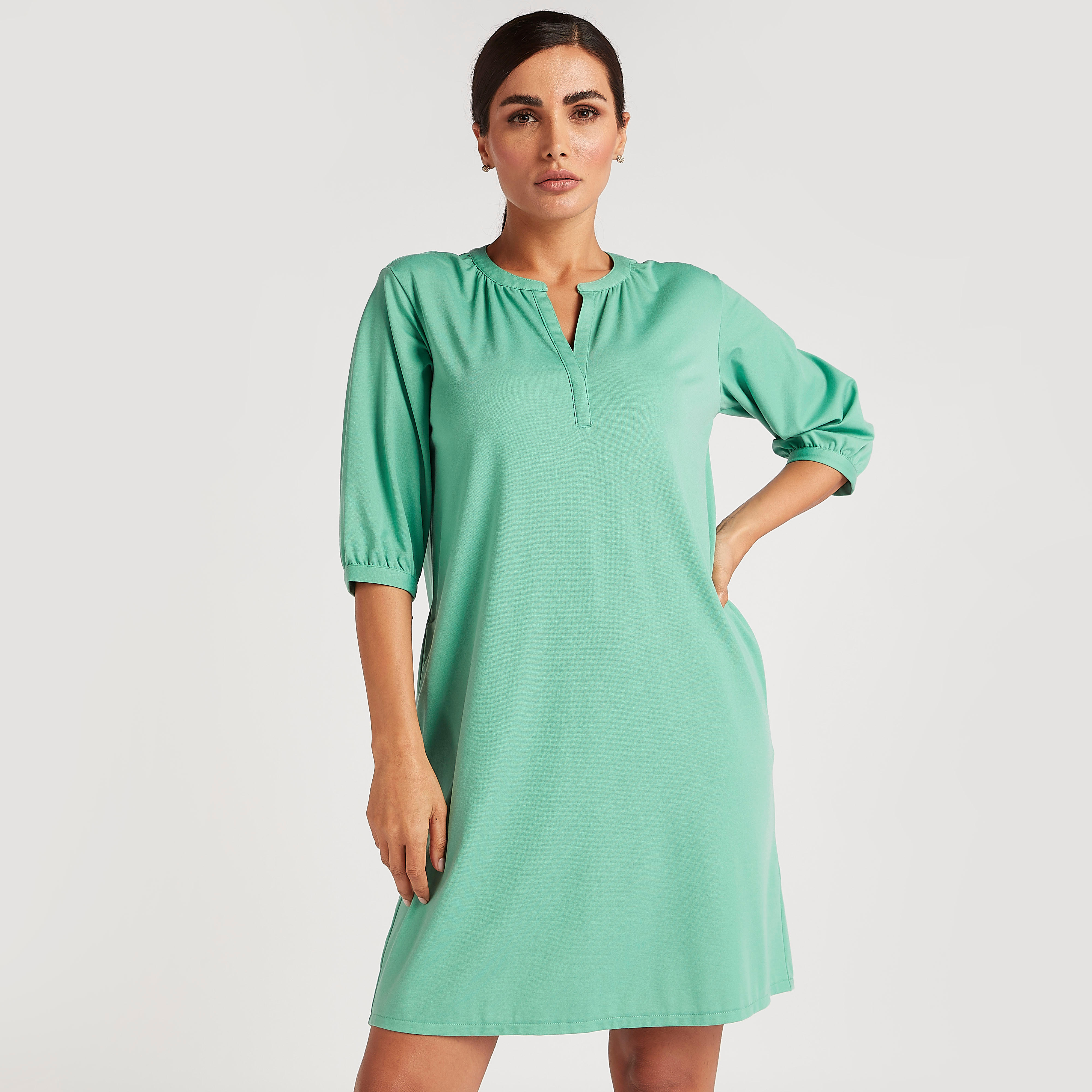 بلوزة تونيك سادة بجيوب وياقة v-women-clothing-dresses-image-12