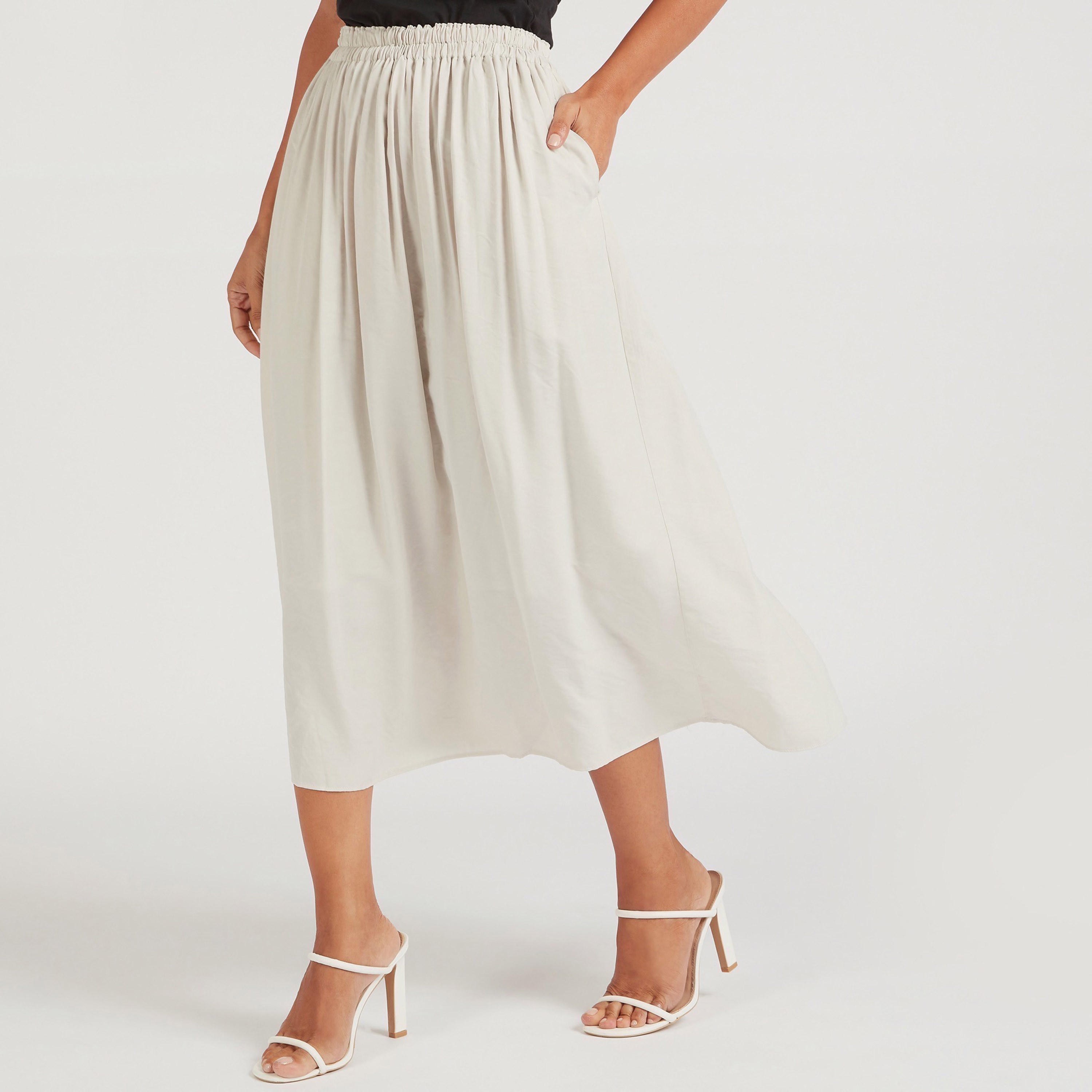 تنورة إيه لاين ميدي سادة بخصر مطّاطي-women-clothing-bottoms-skirts-image-4