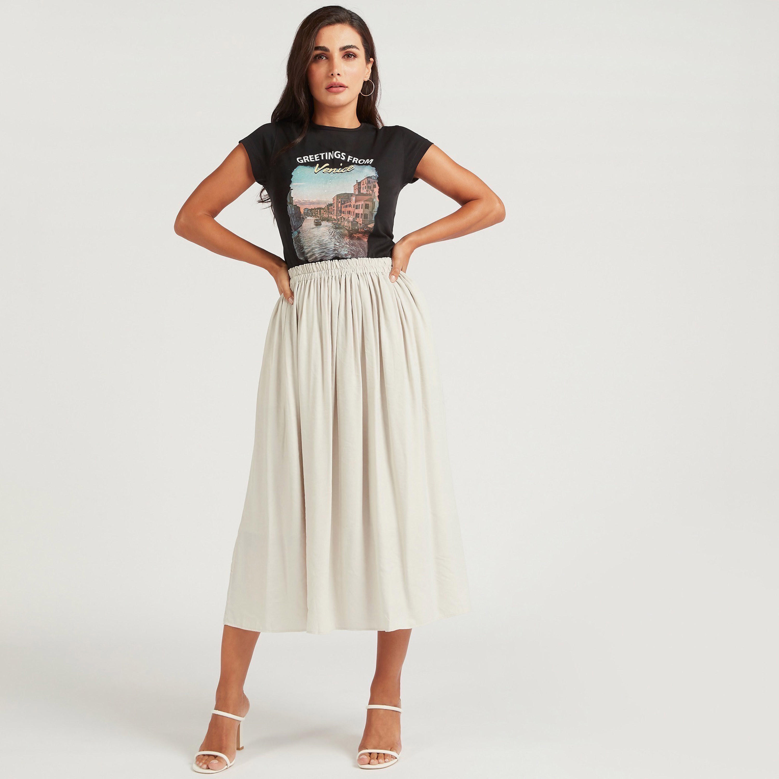 تنورة إيه لاين ميدي سادة بخصر مطّاطي-women-clothing-bottoms-skirts-image-3