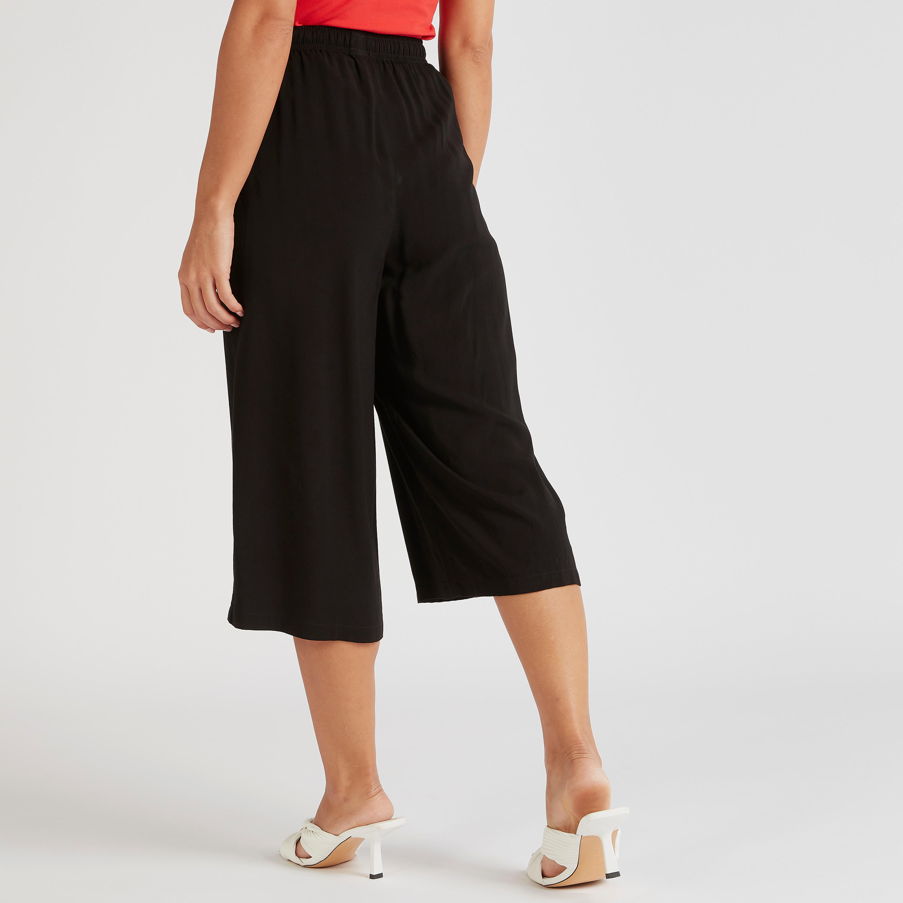 بنطلون كولوتيس سادة بخصر متوسّط الارتفاع ورباط إغلاق وجيوب-women-clothing-bottoms-trousers-image-1