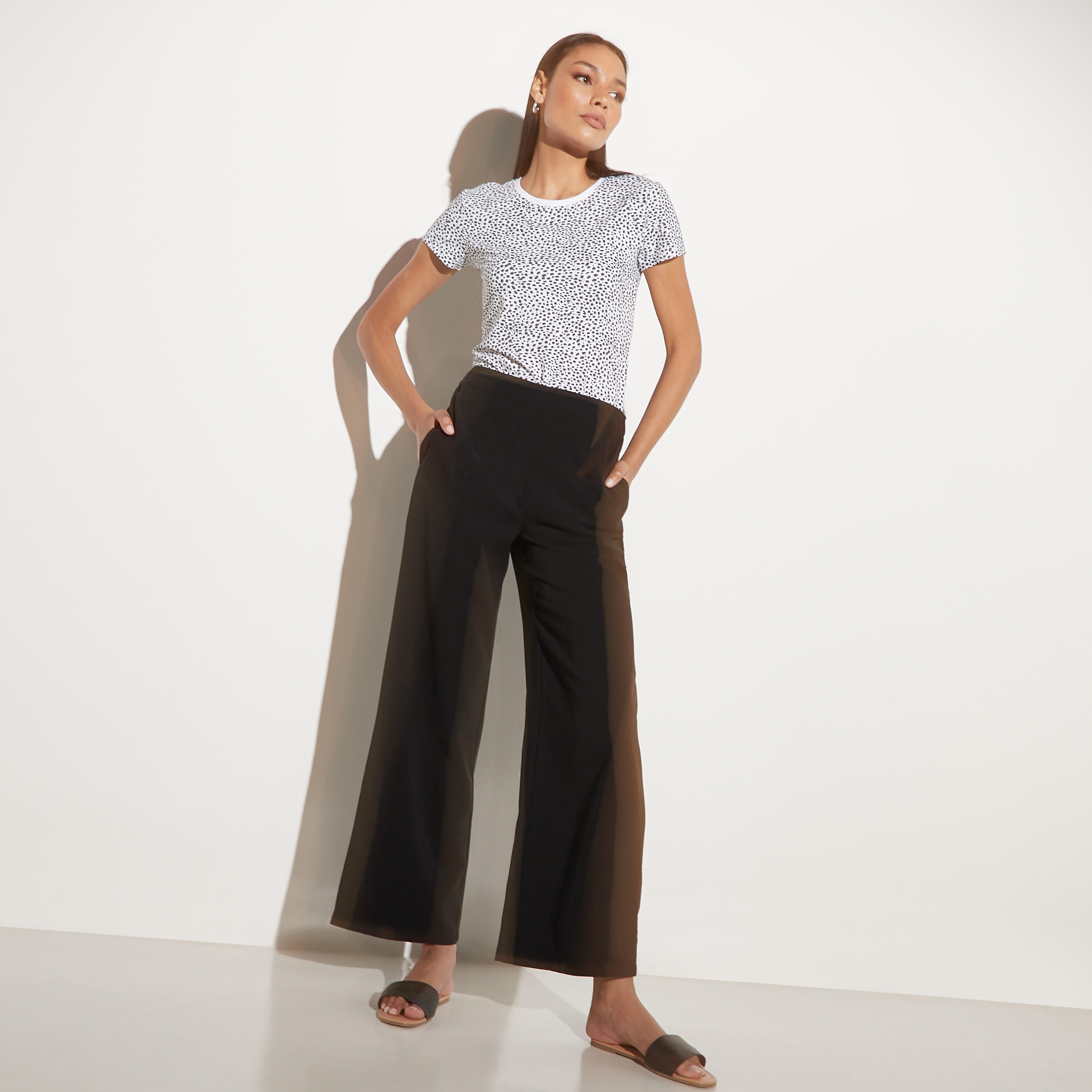 بنطلون واسع الساقين سادة بخصر مطاطي وجيوب-women-clothing-bottoms-trousers-image-2