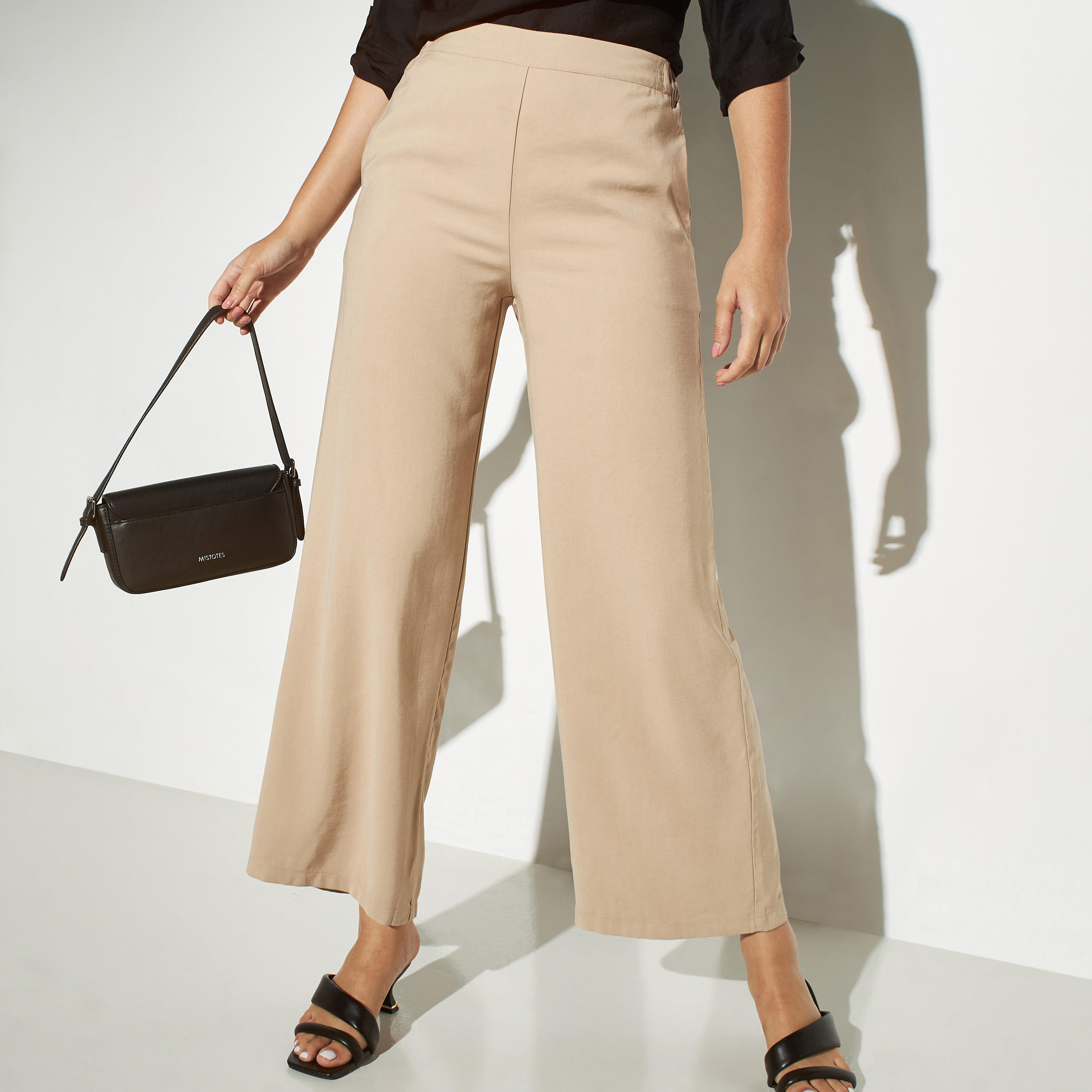 بنطلون واسع الساقين سادة بخصر شبه مطاطي وجيوب-women-clothing-bottoms-trousers-image-4