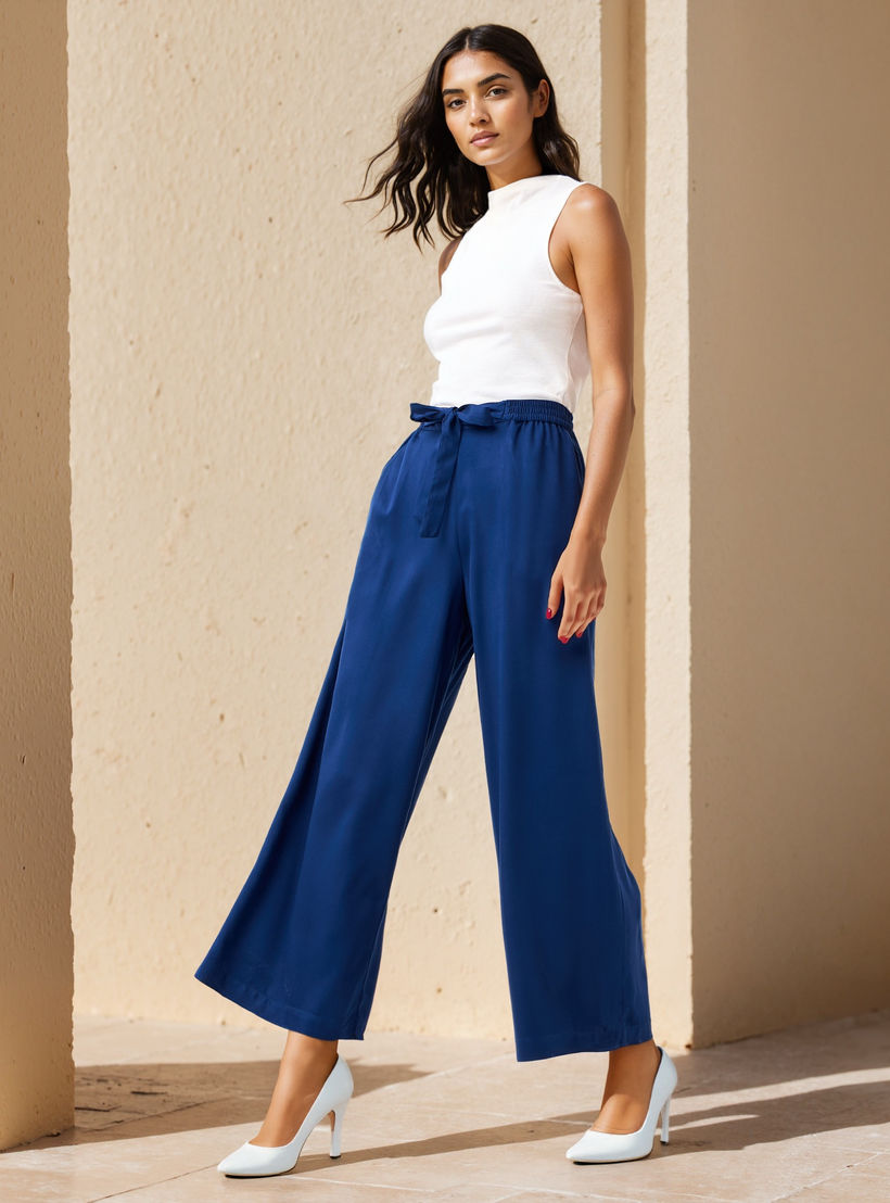 بنطلون بالازو بقصّة مريحة وخصر مطاطي وجيوب وحزام رباط-women-clothing-trousers-image-2