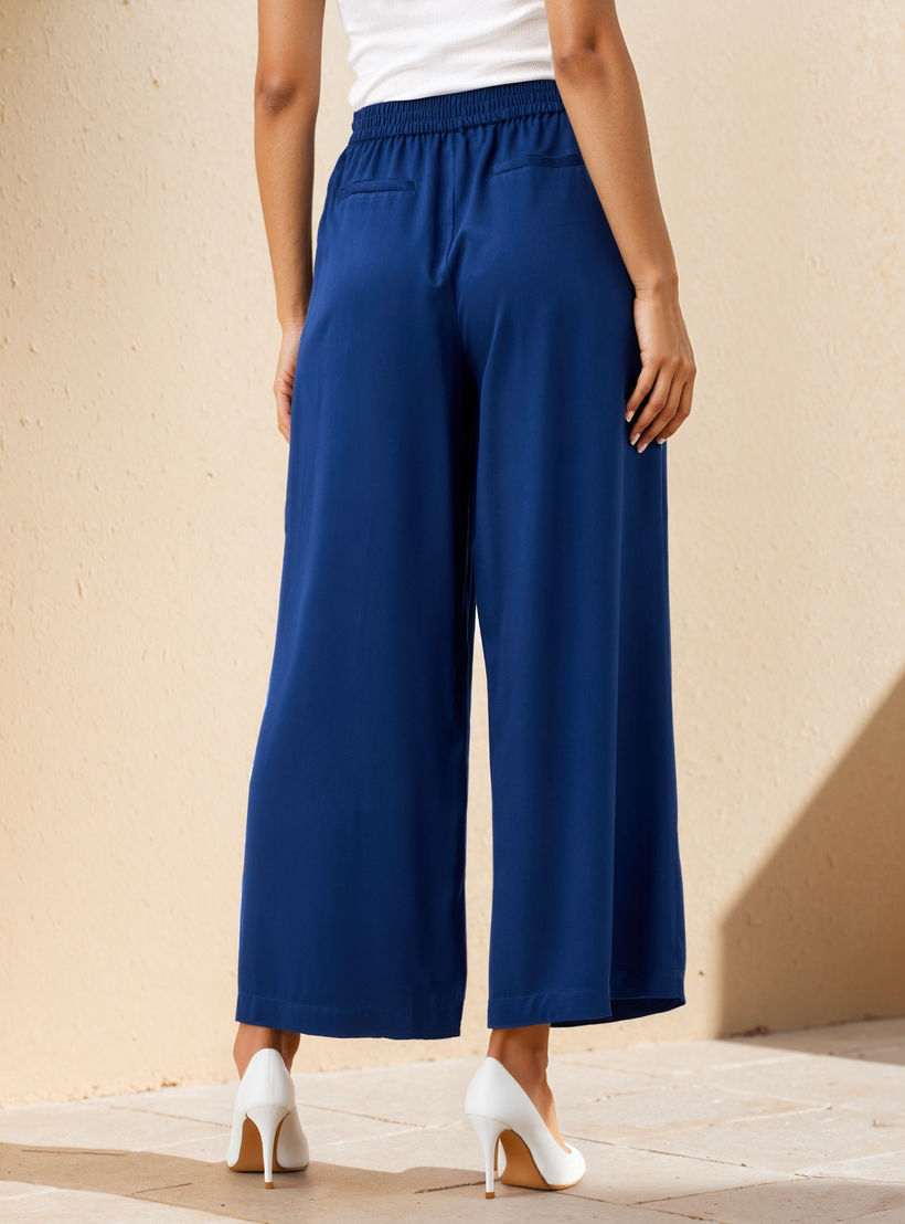 بنطلون بالازو بقصّة مريحة وخصر مطاطي وجيوب وحزام رباط-women-clothing-trousers-image-3