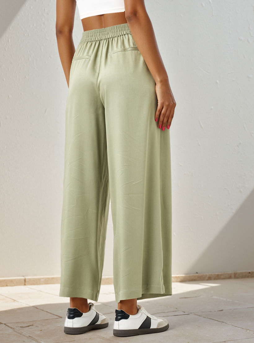 بنطلون بالازو بقصّة مريحة وخصر مطاطي وجيوب وحزام رباط-women-clothing-trousers-image-3