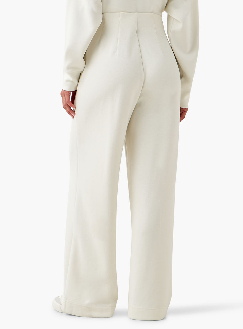 بنطلون واسع الساقين وخصر مرن بملمس ناعم بتفاصيل بينتوك وقصّة عادية-women-clothing-bottoms-joggers-image-4