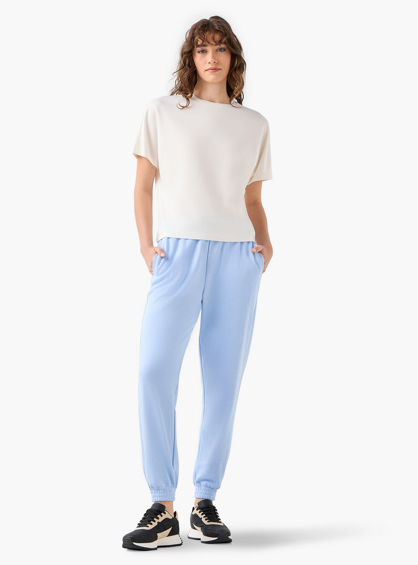 بنطلون رياضي بخصر مرن وجيوب-women-clothing-bottoms-joggers-image-3