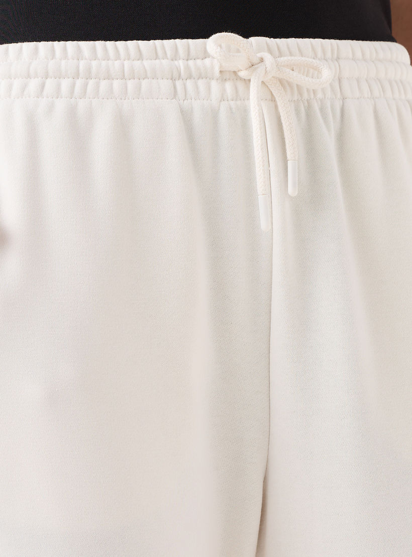 بنطلون رياضي بخصر مرن وجيوب-women-clothing-bottoms-joggers-image-5