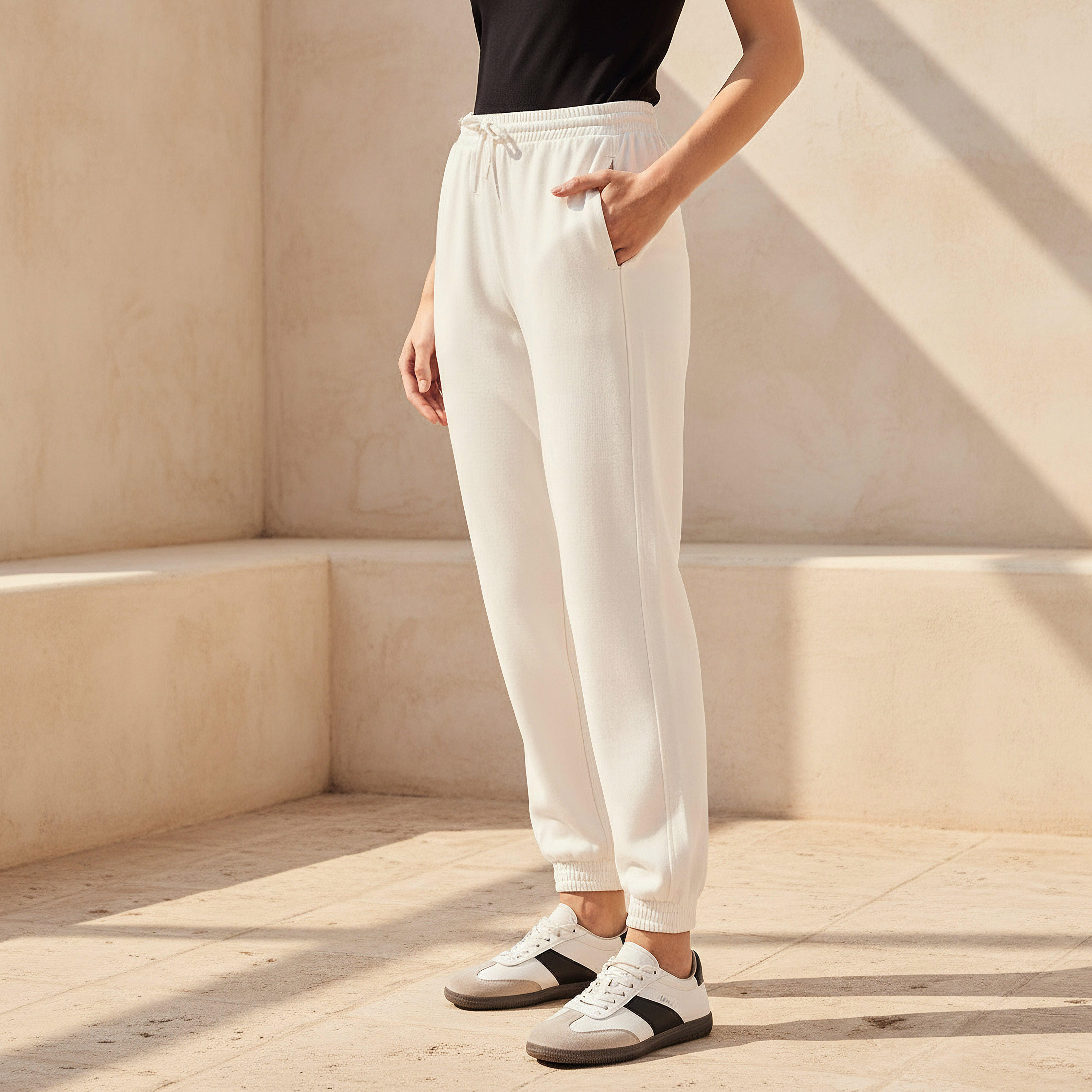 بنطلون رياضي بخصر مرن وجيوب-women-clothing-bottoms-joggers-image-1