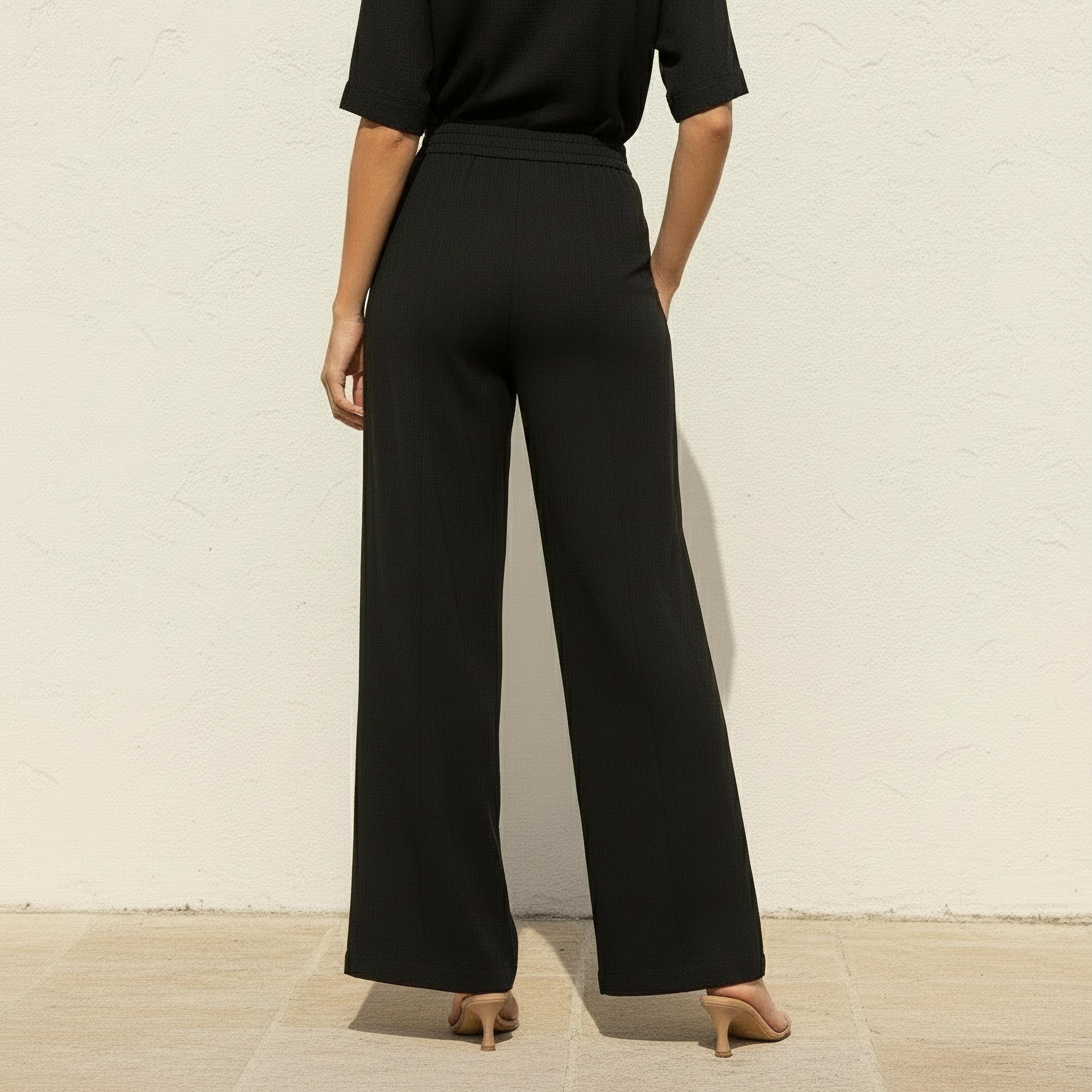 بنطلون واسع الساقين بتفاصيل كسرات وخصر مطاطي-women-clothing-bottoms-trousers-image-4