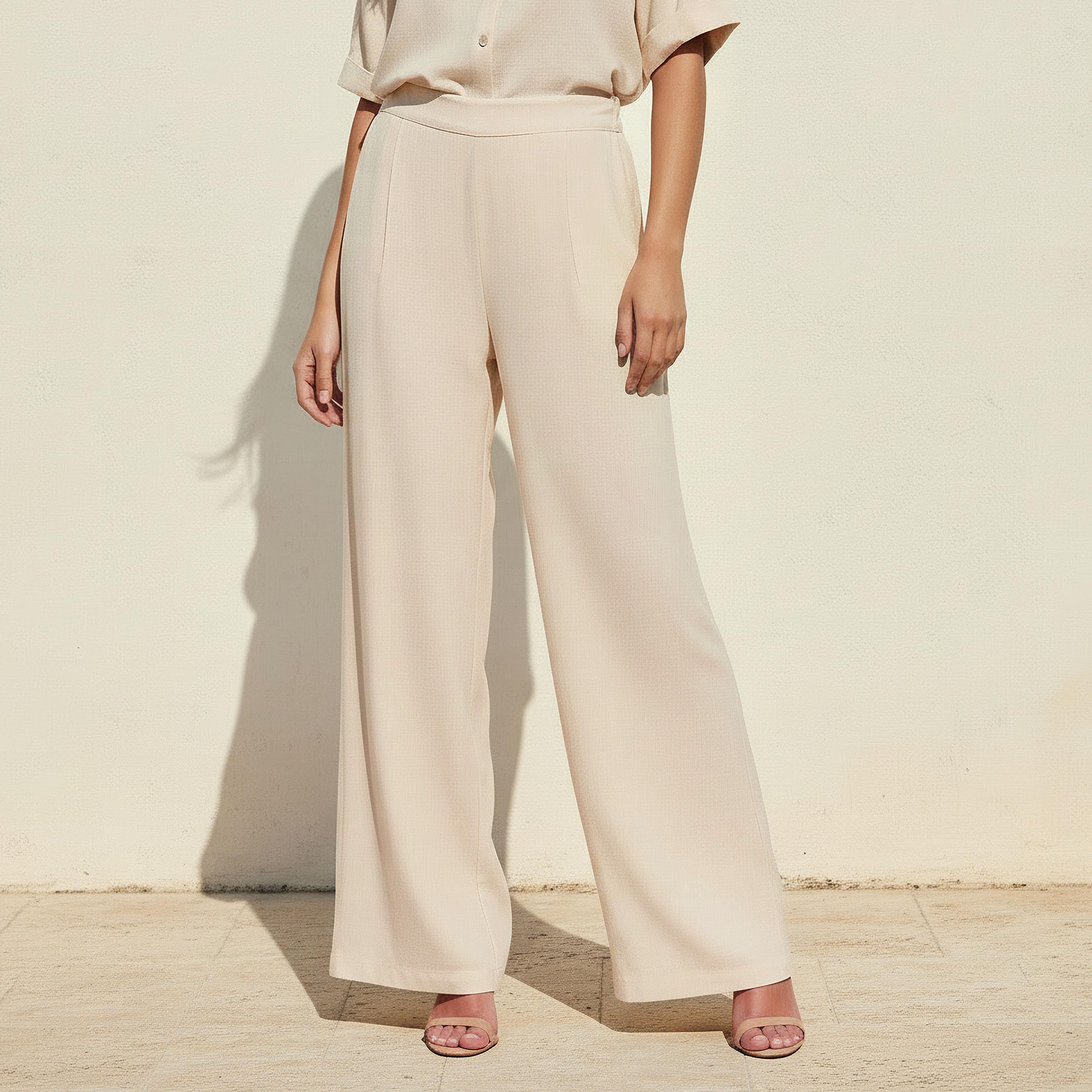 بنطلون واسع الساقين بتفاصيل كسرات وخصر مطاطي-women-clothing-bottoms-trousers-image-1