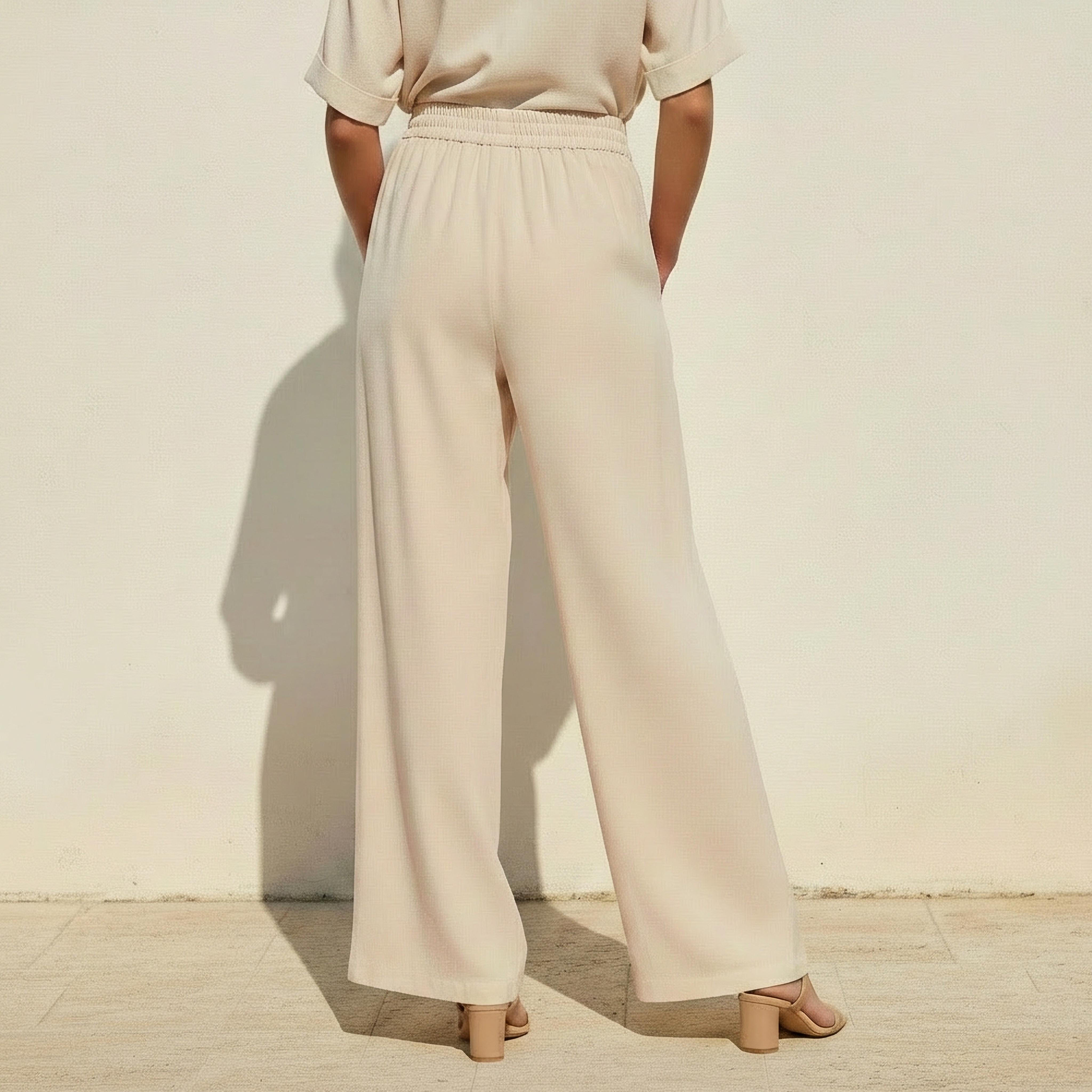 بنطلون واسع الساقين بتفاصيل كسرات وخصر مطاطي-women-clothing-bottoms-trousers-image-4