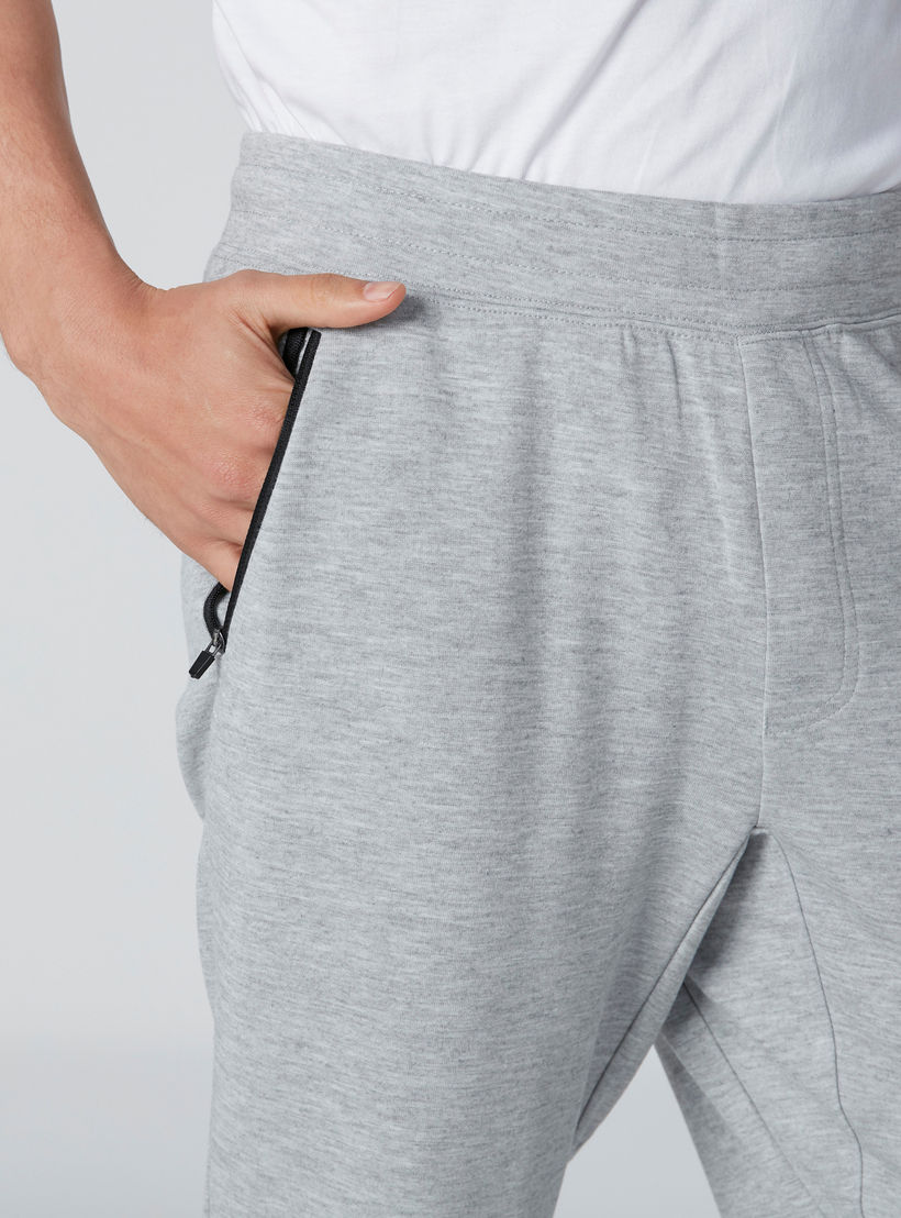 بنطال رياضي بخصر مطّاطي وجيوب-men-clothing-bottoms-joggers-image-4