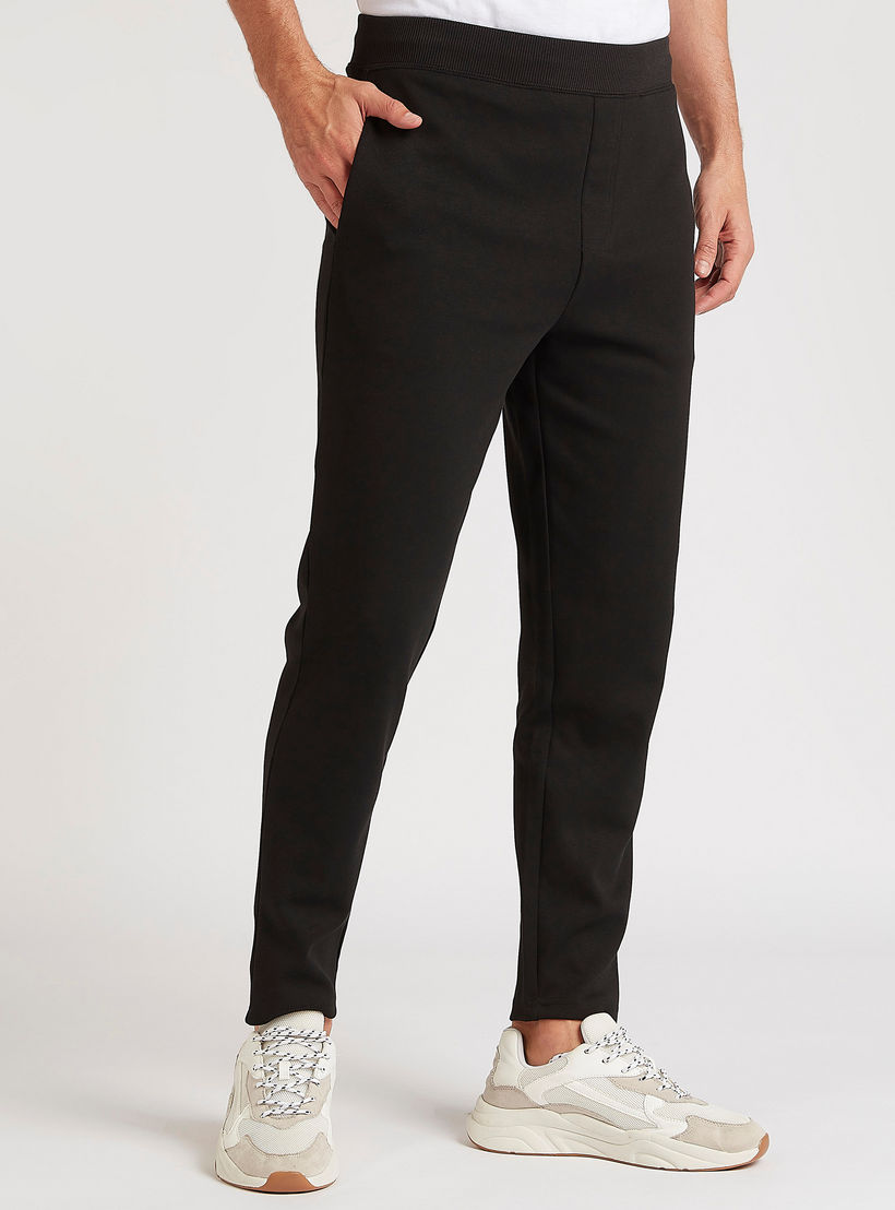 بنطلون سادة بخصر فليكسي وجيوب-men-clothing-bottoms-trousersandchinos-trousers-image-4