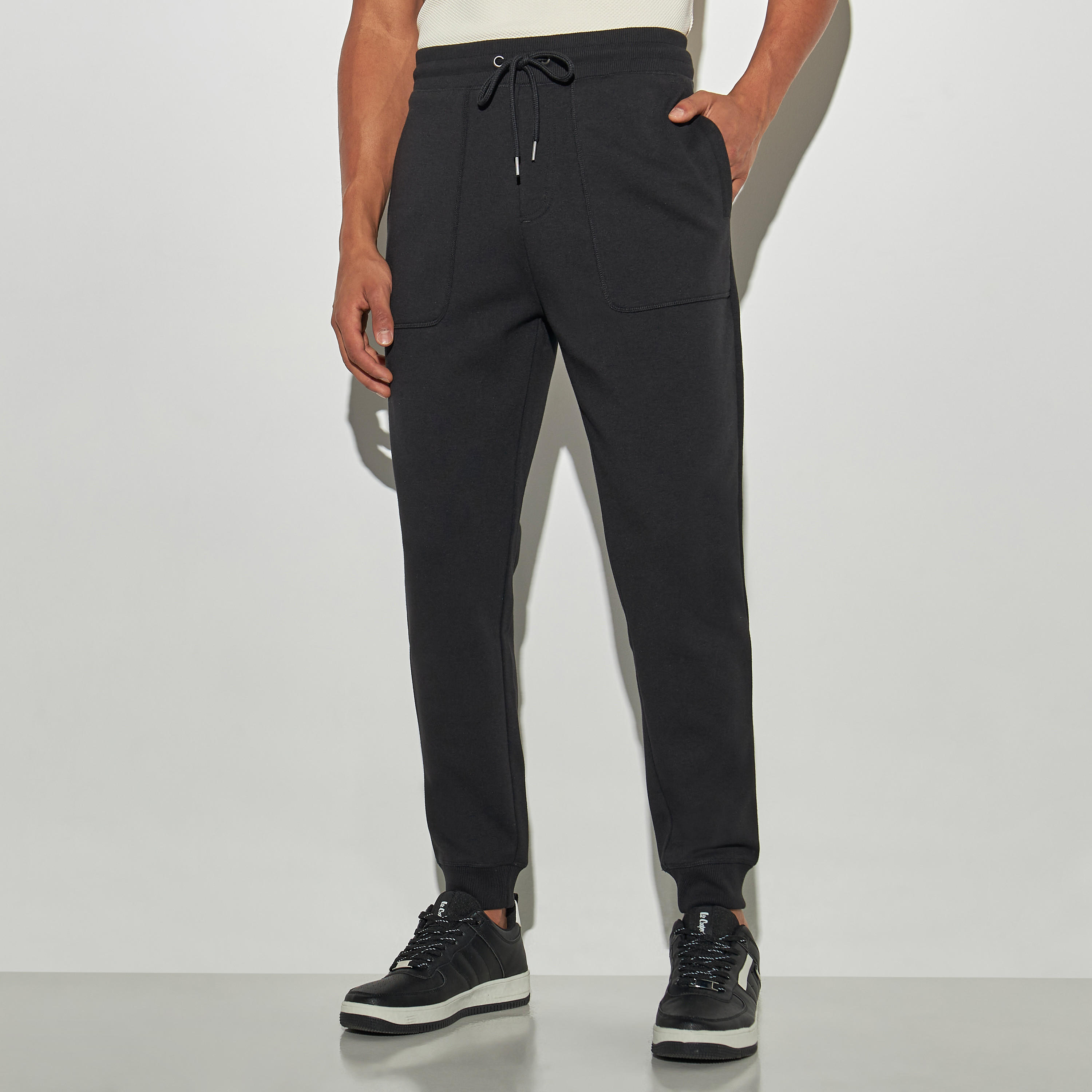 Solid Joggers with Drawstring Closure and Pockets-men-clothing-bottoms-joggers-image-1
