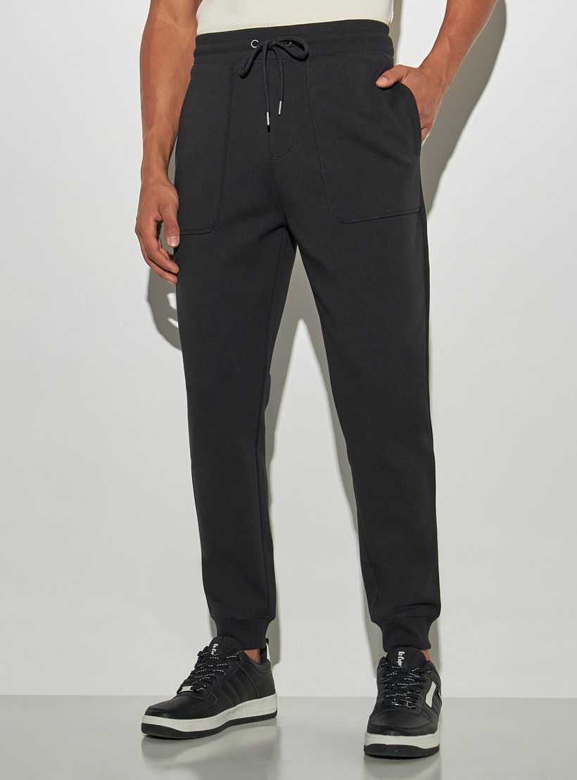 Solid Joggers with Drawstring Closure and Pockets-men-clothing-bottoms-joggers-image-1