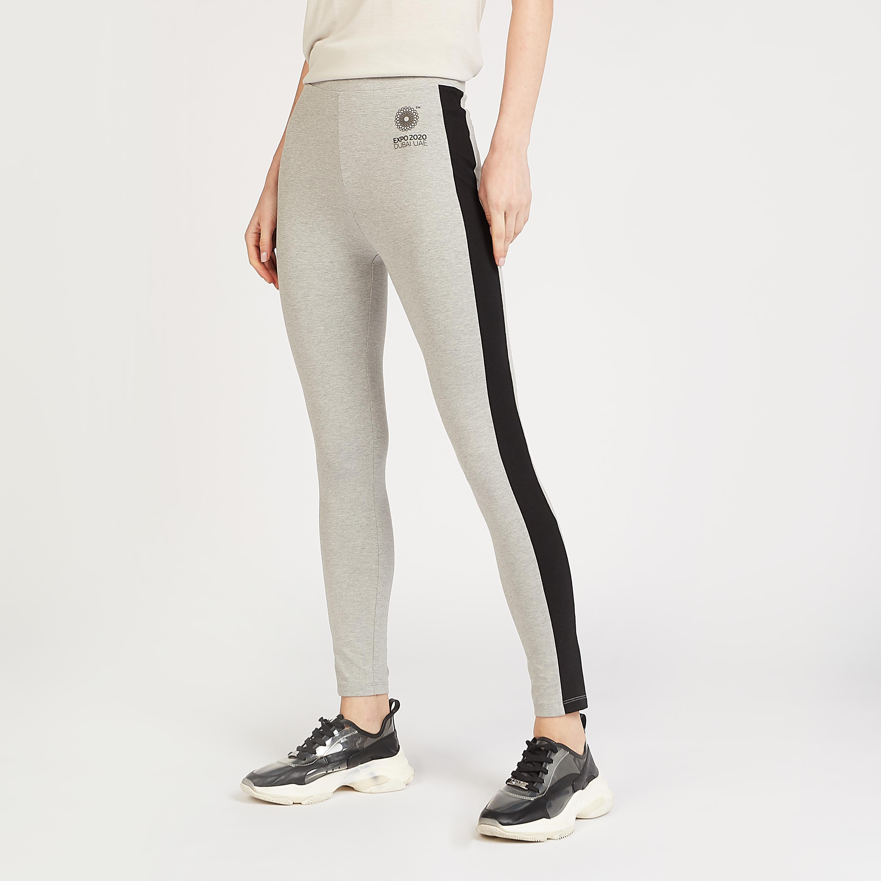 بنطلون ليقنز بخصر مطّاطي متوسط الارتفاع بطبعات إكسبو 2020-women-clothing-bottoms-leggings-image-1